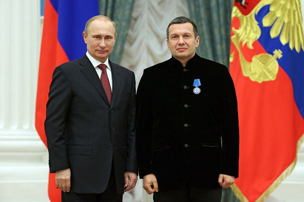 Russian leader Vladimir Putin and pro-Kremlin TV presenter Vladimir Solovyov during the ceremony of presenting state awards of the Russian Federation in the Kremlin, Moscow, Russia, December 25, 2013. (Source: interfax) Russian leader Vladimir Putin and pro-Kremlin TV presenter Vladimir Solovyov during the ceremony of presenting state awards of the Russian Federation in the Kremlin, Moscow, Russia, December 25, 2013. (Source: interfax)