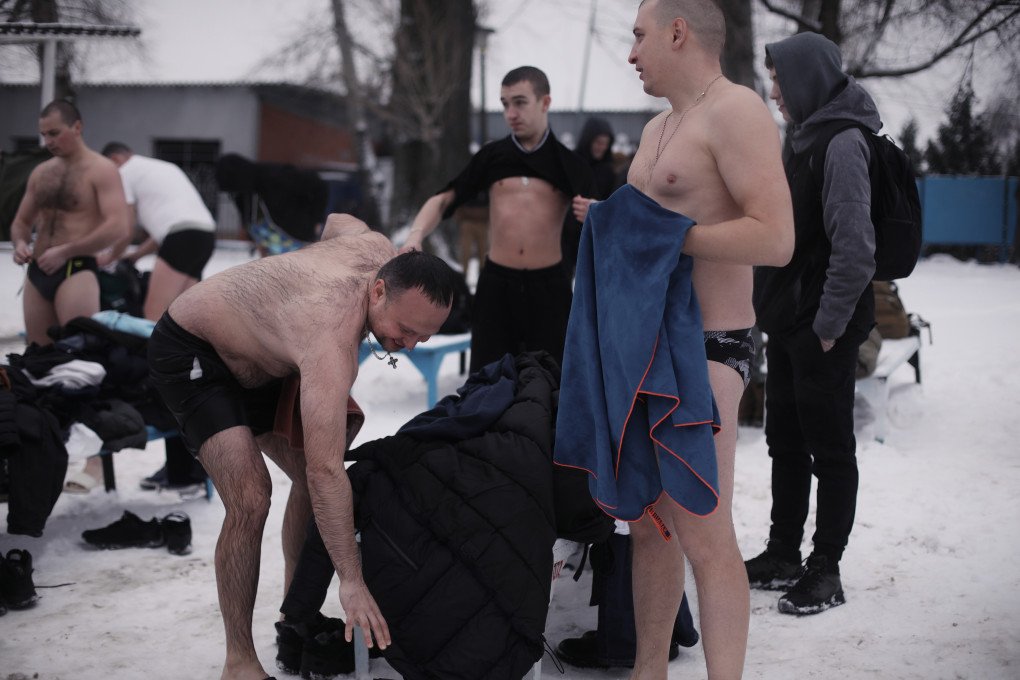 A group of men, chat after their annual Epiphany plunge. Kyiv, Ukraine, January 6, 2026. (Photo: Lucile Brizard) A group of men, chat after their annual Epiphany plunge. Kyiv, Ukraine, January 6, 2026. (Photo: Lucile Brizard)