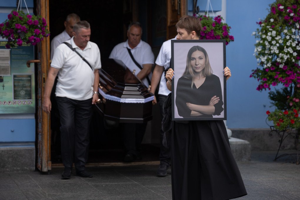 People carry a portrait and a coffin of Ukrainian journalist Viktoriia Roshchyna during a farewell ceremony at St. Michael’s Golden-Domed Cathedral on August 8, 2025 in Kyiv, Ukraine. Photo by Oleksandr Magula/Suspilne Ukraine/JSC “UA: PBC"/Global Images Ukraine. People carry a portrait and a coffin of Ukrainian journalist Viktoriia Roshchyna during a farewell ceremony at St. Michael’s Golden-Domed Cathedral on August 8, 2025 in Kyiv, Ukraine. Photo by Oleksandr Magula/Suspilne Ukraine/JSC “UA: PBC"/Global Images Ukraine.