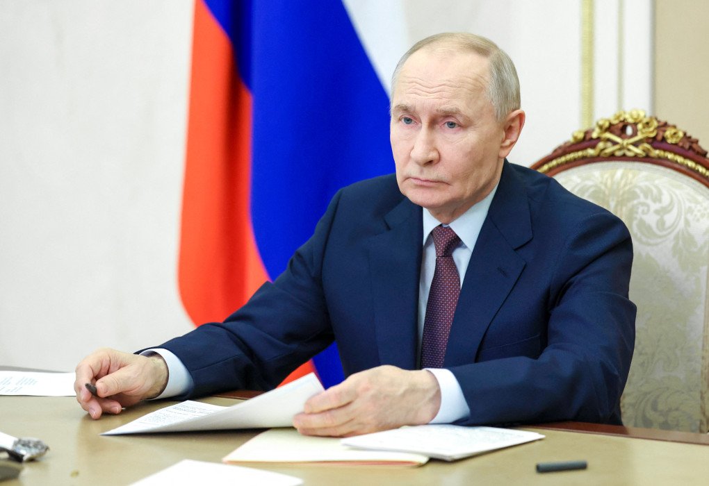 Russian leader Vladimir Putin chairs a meeting with members of the government via videolink in Moscow on January 21, 2026. (Vyacheslav PROKOFYEV / POOL / AFP via Getty Images)