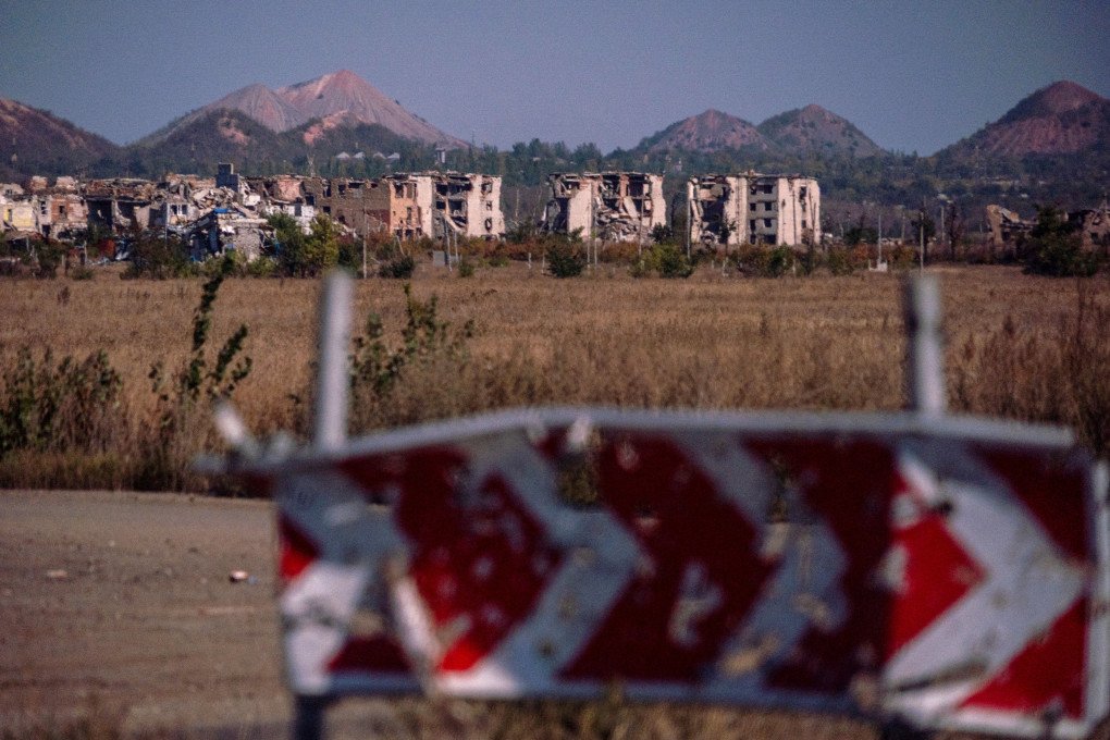 This photograph, taken on September 27, 2025, shows residential buildings destroyed by Russian forces, with terricones in the background, in Marinka, Donetsk region, Ukraine. (Photo by Andrey Borodulin via Getty Images) This photograph, taken on September 27, 2025, shows residential buildings destroyed by Russian forces, with terricones in the background, in Marinka, Donetsk region, Ukraine. (Photo by Andrey Borodulin via Getty Images)