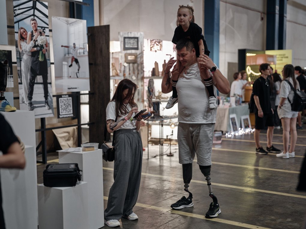 Vania Marchak, a war veteran who underwent rehabilitation at the "Superhumans" center at the "Kurazh” fair with his family in Kyiv, Ukraine. (Photo: Kostiantyn Liberov/Libkos/Getty Images) Vania Marchak, a war veteran who underwent rehabilitation at the "Superhumans" center at the "Kurazh” fair with his family in Kyiv, Ukraine. (Photo: Kostiantyn Liberov/Libkos/Getty Images)