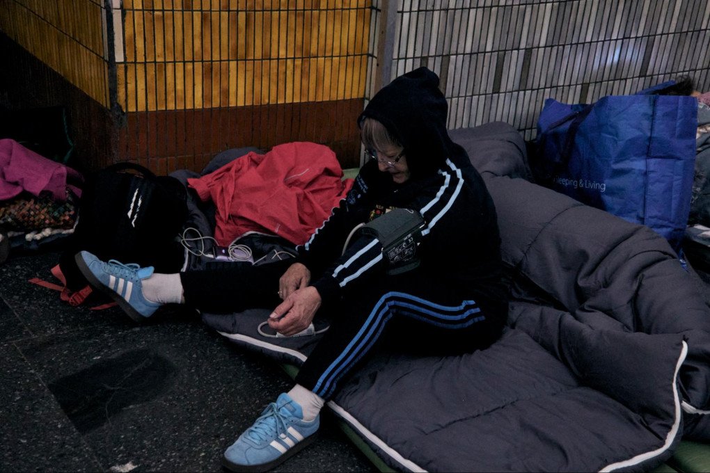A Kyiv woman takes shelter in a metro station, tens of meters underground, and takes her blood pressure. Kyiv, Ukraine, October 6, 2026 (Photo: Louis Beaudemont/UNITED24 Media)