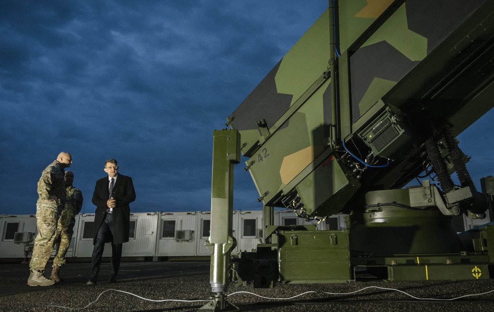Danish Defence Minister Troels Lund Poulsen (R) attends the presentation of one of Denmark's new ground-based air defence systems, the NASAMS system, at Air Base Skalstrup near Gadstrup, Denmark, on December 17, 2025. (Photo by Emil Nicolai via Getty Images)