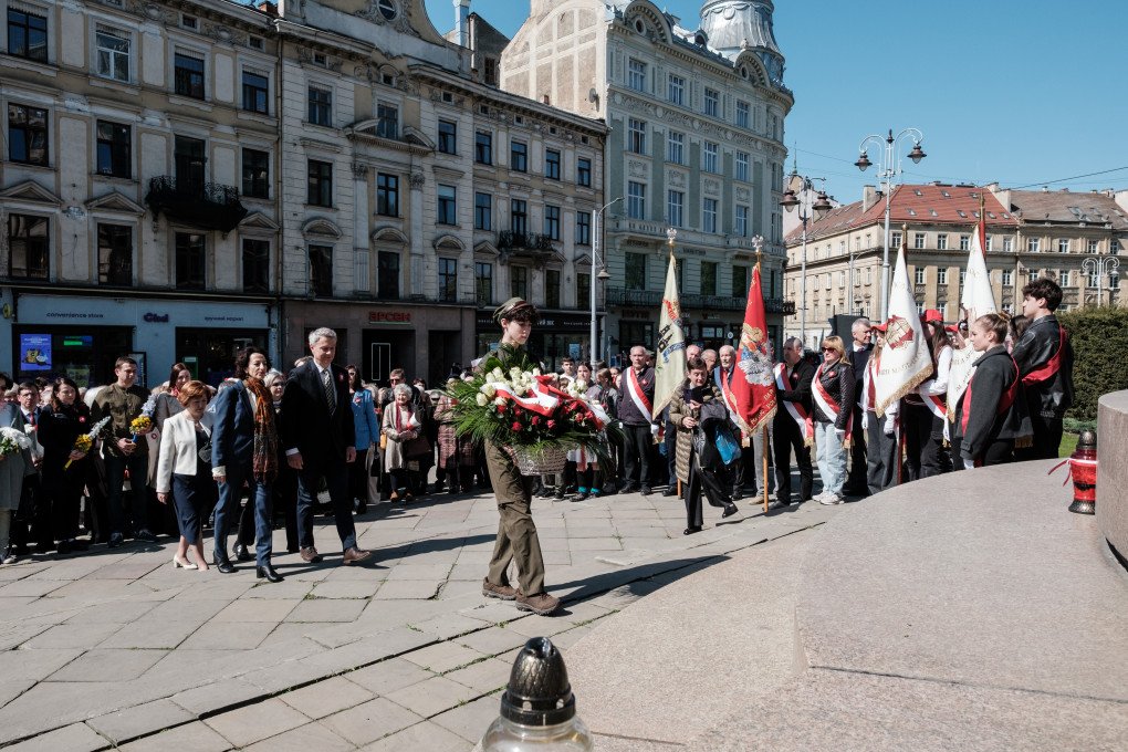 People bring flowers to the monument to the Polish poet Adam Mickiewicz to mark the 235th anniversary of the Polish Constitution on May 3, 2026 in Lviv, Ukraine. (Photo by Les Kasyanov via Getty Images) monument to the Polish poet Adam Mickiewicz in Lviv, Ukraine