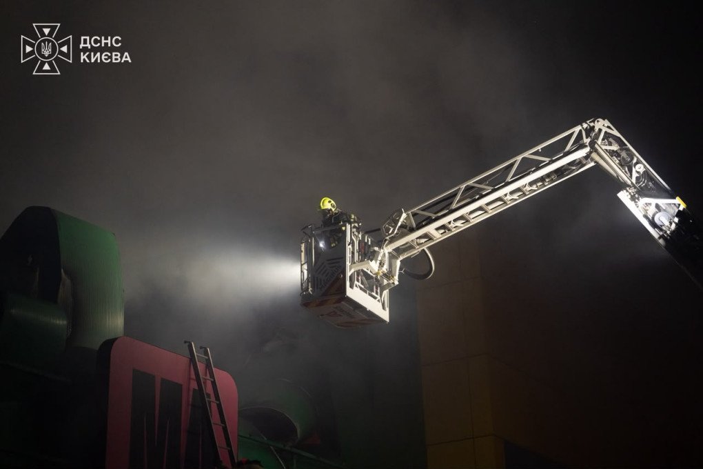 Emergency crews work from an aerial platform during firefighting operations after a Russian strike on Kyiv. (Source: State Emergency Service of Ukraine)