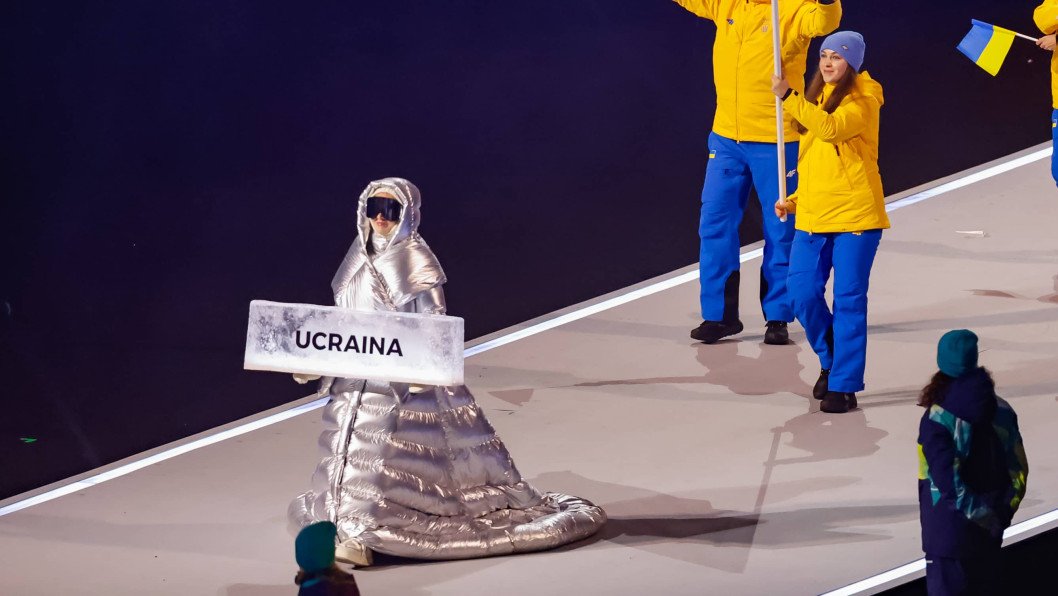 How a Russian National Ended Up Carrying Ukraine’s Sign at the Winter Olympic Games Ceremony