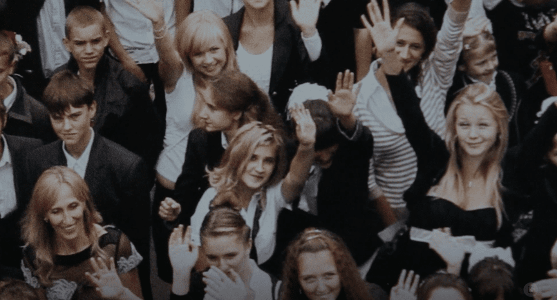 A still from Timestamp features a photograph taken in 2017, showing children looking up at the camera during an annual tradition at this Ukrainian school. (Source: 2Brave Productions)
