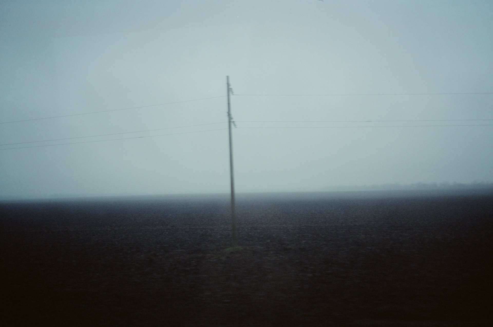 Fog over a road in Donbas.  Photo by Joshua Olley/UNITED24 Media