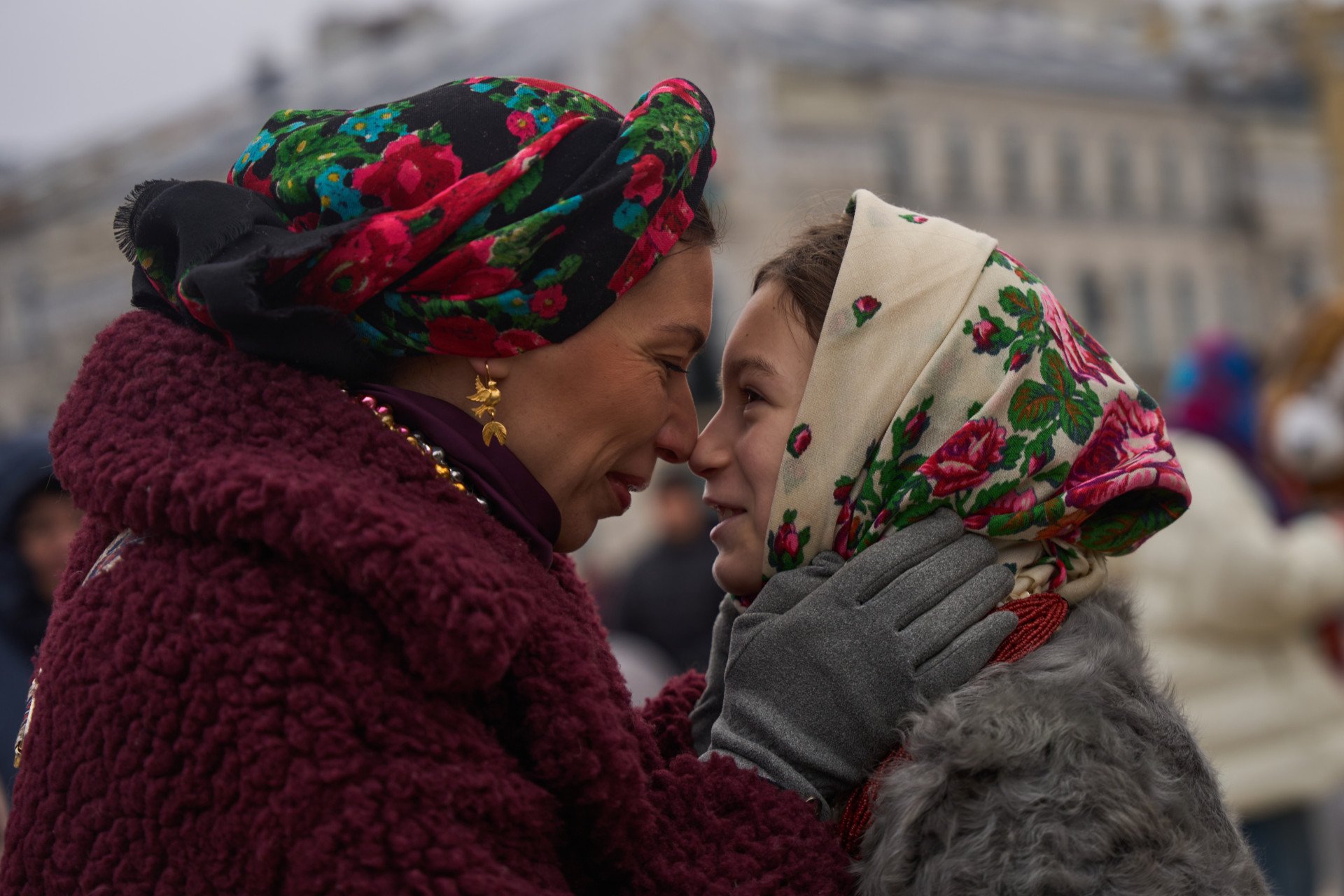 People come together with their loved ones to take part in the Christmas carol procession.