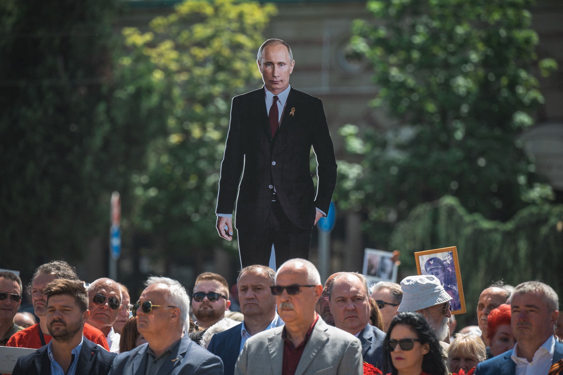 A man holds a cutout of Russian leader Vladimir Putin during the “Immortal Regiment” march in Belgrade on May 9, 2022. (Source: Getty Images) A man holds a cutout of Russian leader Vladimir Putin during the “Immortal Regiment” march in Belgrade on May 9, 2022. (Source: Getty Images)
