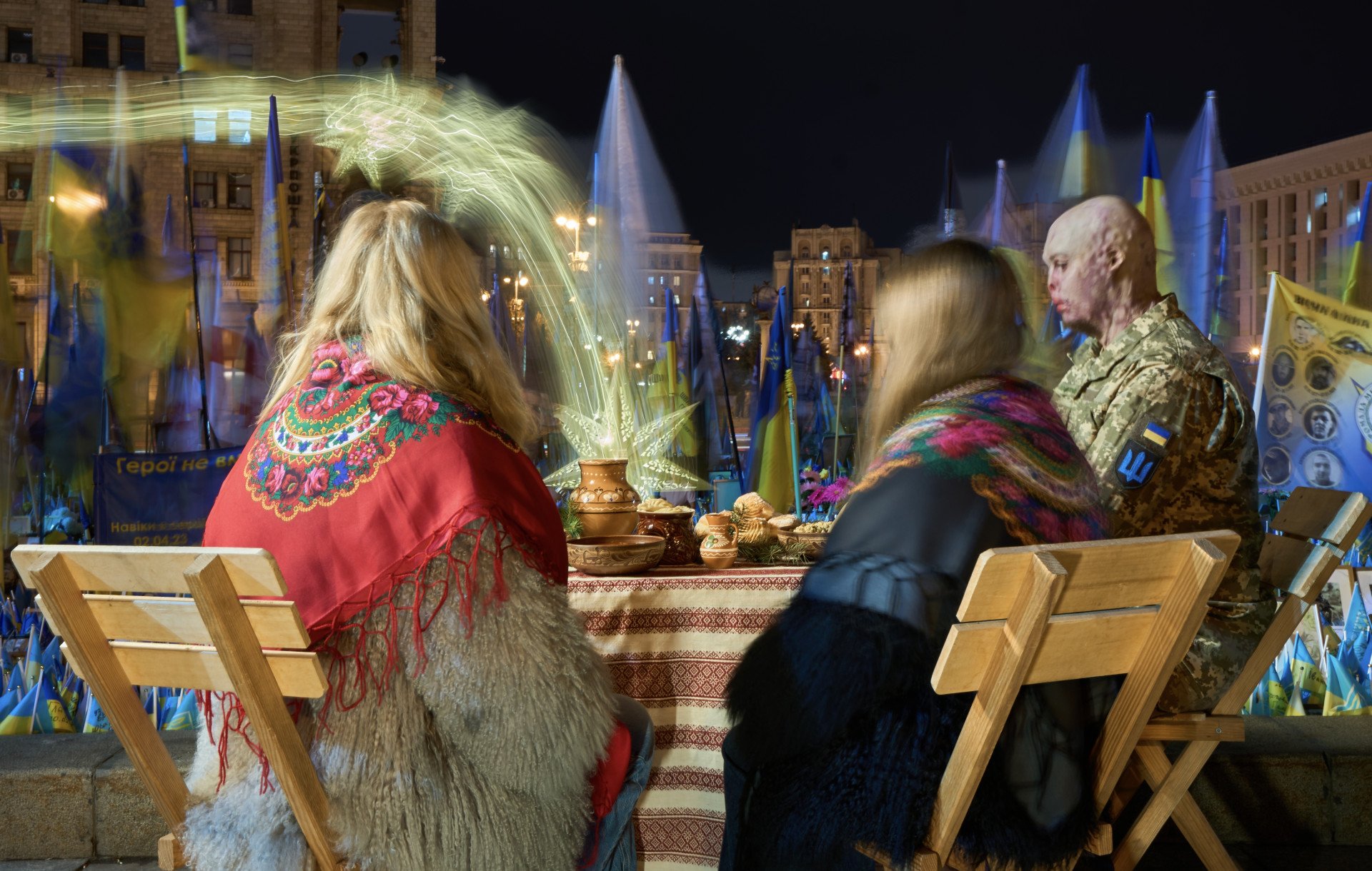 As the family gathers, the souls of fallen defenders are present at the Christmas table, embodied in the light of the Christmas star. Tonight, both the star and and nation’s thoughts are dedicated to them. The table itself stands as a powerful symbol of unity, life, hope, peace, and light. (Photo: Mykyta Shandyba)