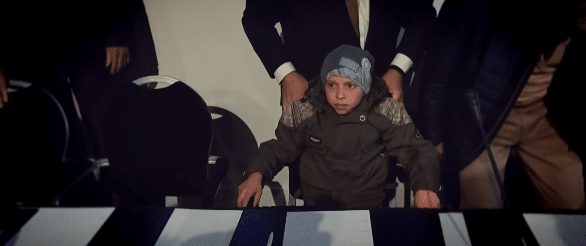 Hassan Diab, just 11 years old, testifies at a Russian-organized press conference at The Hague in 2018. (Source: RT) Hassan Diab, just 11 years old, testifies at a Russian-organized press conference at The Hague in 2018. (Source: RT)