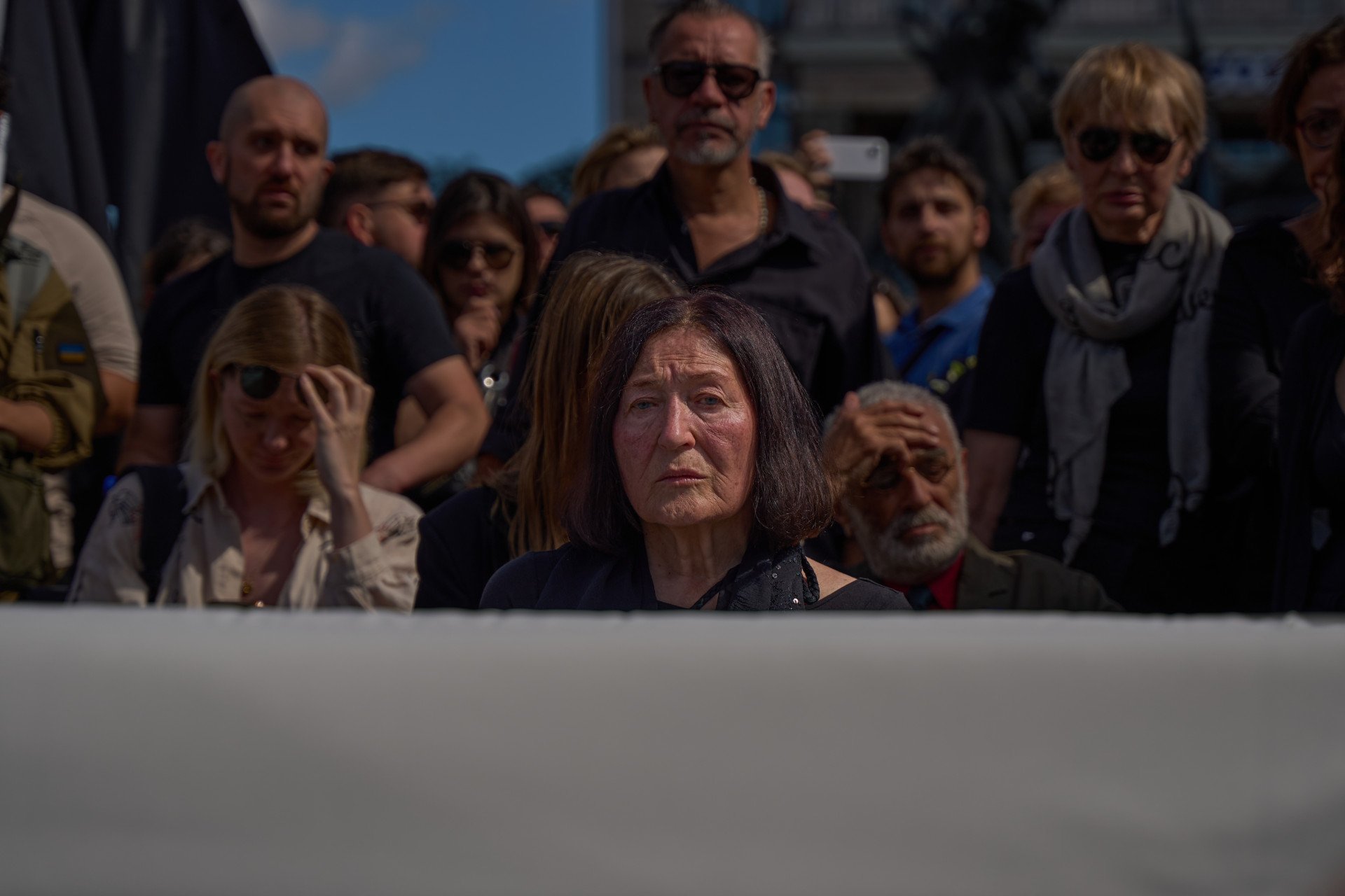 David’s mother, artist Tetiana Illiakhova, during the farewell ceremony honoring artist and serviceman David Chichkan at Kyiv’s Independence Square, August 18, 2025, Kyiv, Ukraine. Photo by Mykyta Shandyba/UNITED24 Media.
