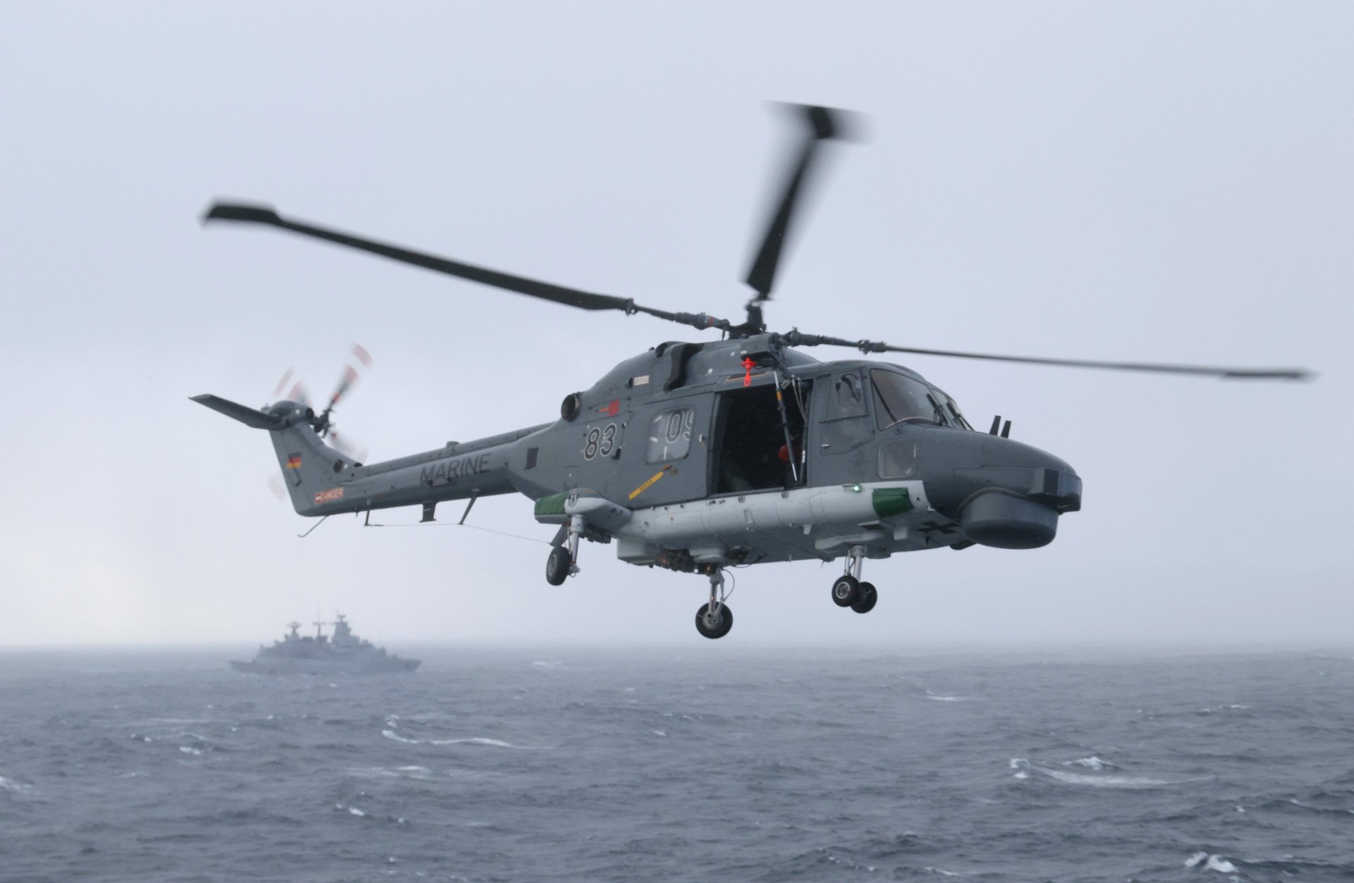 A Westland Lynx helicopter of the German Navy flies during the Andoya “Missile Firing Exercise 2025” military exercise in the North Sea on October 16, 2025, near Harstad, Norway. (Source: Getty Images)