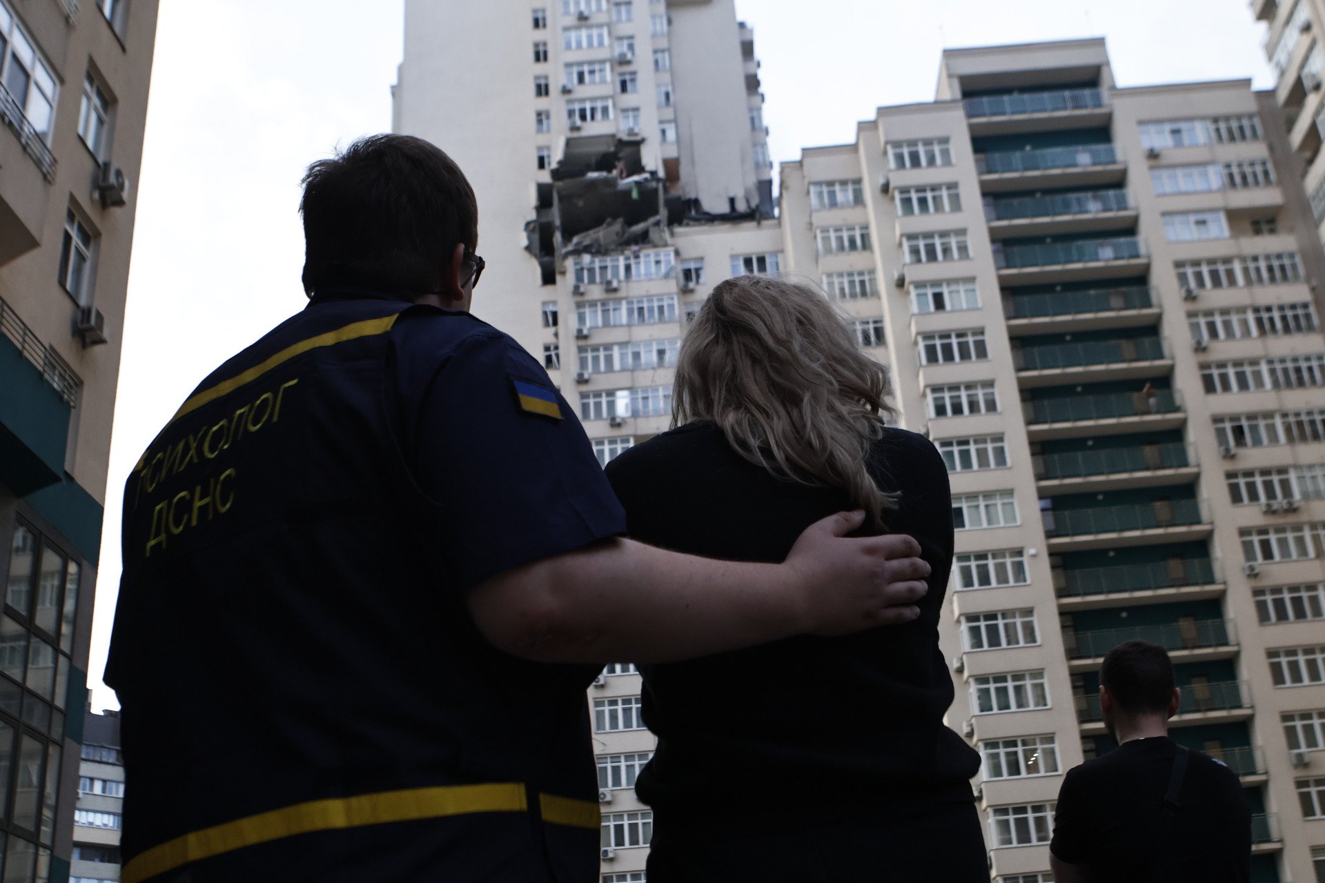 A psychologist of the State Emergency Service of Ukraine works with a resident of a high-rise building hit by a Russian missile on June 24, 2023 in Kyiv, Ukraine. (Photo by Yan Dobronosov/Global Images Ukraine via Getty Images) A psychologist of the State Emergency Service of Ukraine works with a resident of a high-rise building hit by a Russian missile on June 24, 2023 in Kyiv, Ukraine. (Photo by Yan Dobronosov/Global Images Ukraine via Getty Images)