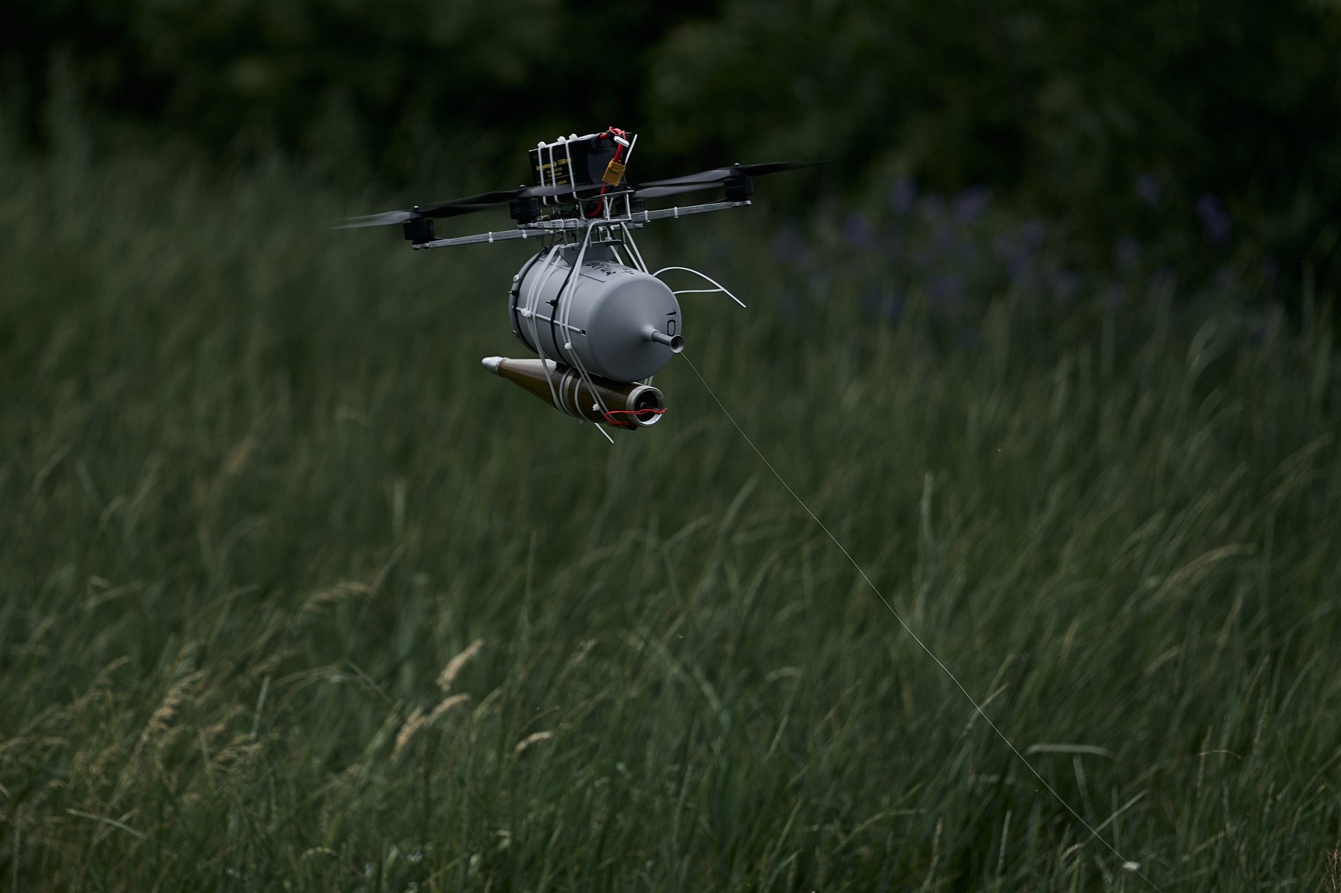 A drone armed with a warhead is flown as pilots of the 28th mechanised brigade of the Armed Forces of Ukraine test a fibre optic FPV drone with RPG munition on June 18, 2025 near Kostiantynivka, Donetsk Region, Ukraine. Photo by Kostiantyn Liberov/Libkos via Getty Images.