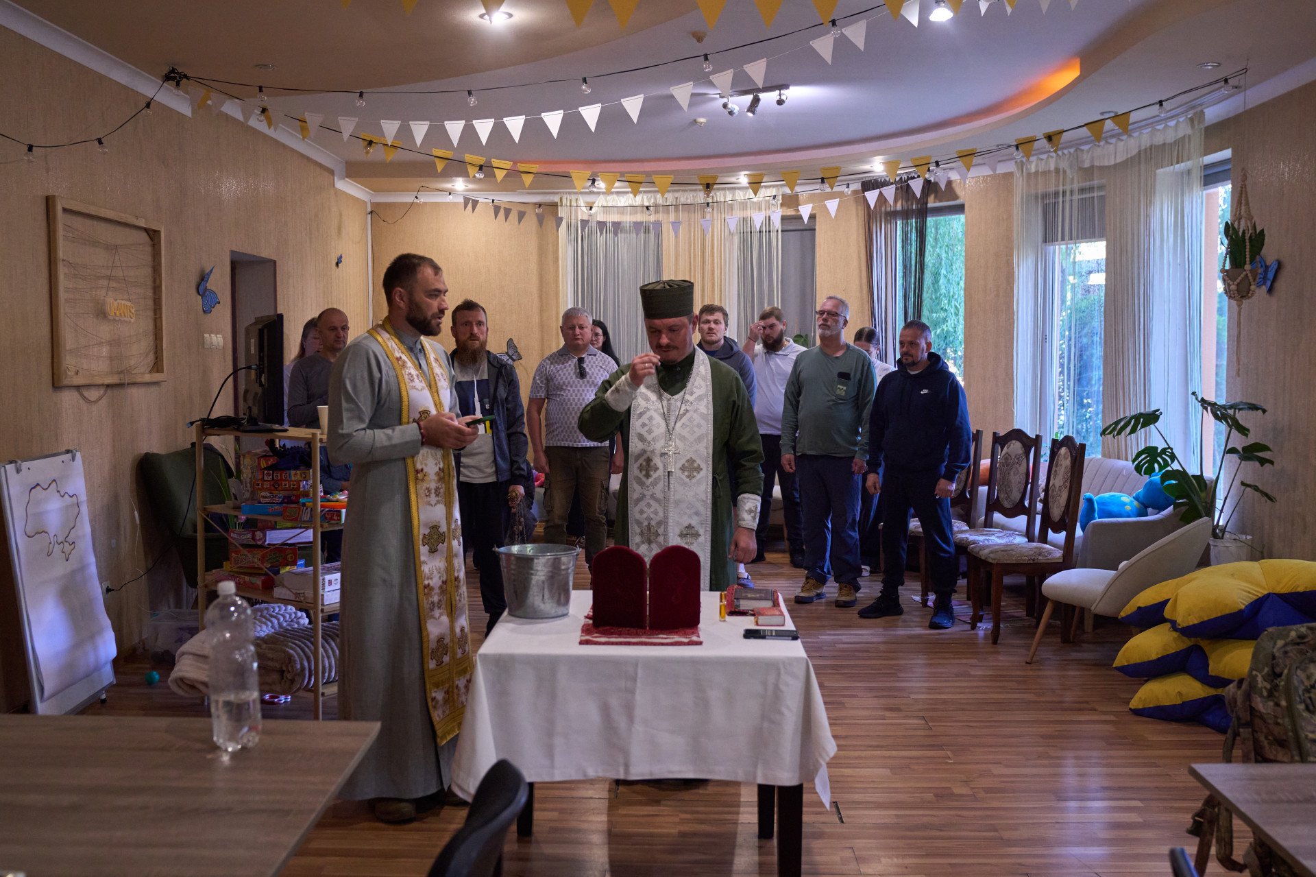 The liturgy is being held in the playroom—for one morning, it was set up for the project participants to pray together. (Photo: Mykyta Shandyba/ UNITED24 Media) The liturgy is being held in the playroom—for one morning, it was set up for the project participants to pray together. (Photo: Mykyta Shandyba/ UNITED24 Media)
