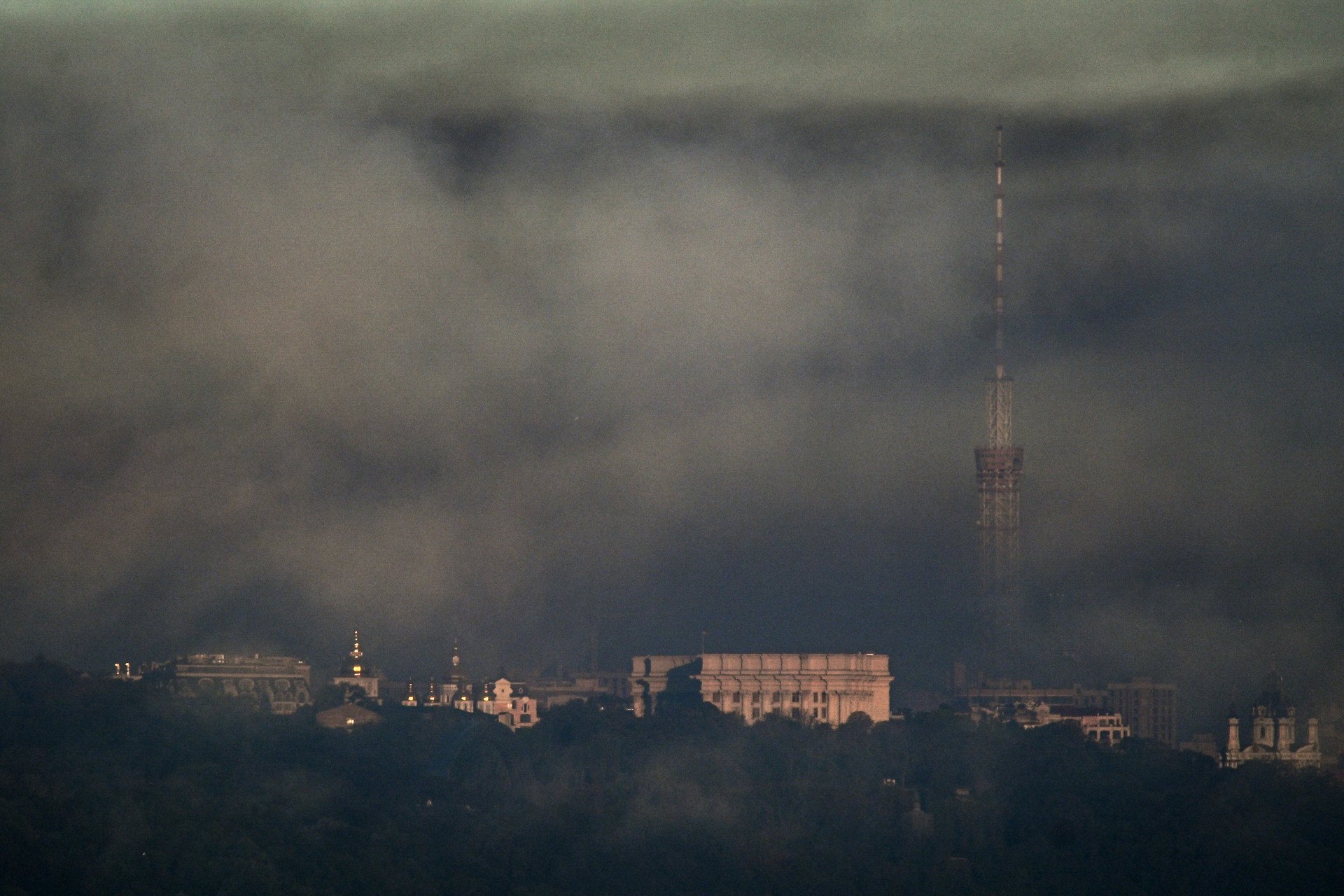Smoke rises above the Ukrainian Ministry of Foreign Affairs (C), St. Michael's Golden-Domed Monastery (L) and St. Andrew's Church (R) following an air attack in Kyiv on September 23, 2026, amid the Russian invasion of Ukraine. (Photo by Eugene Kotenko via Getty Images)