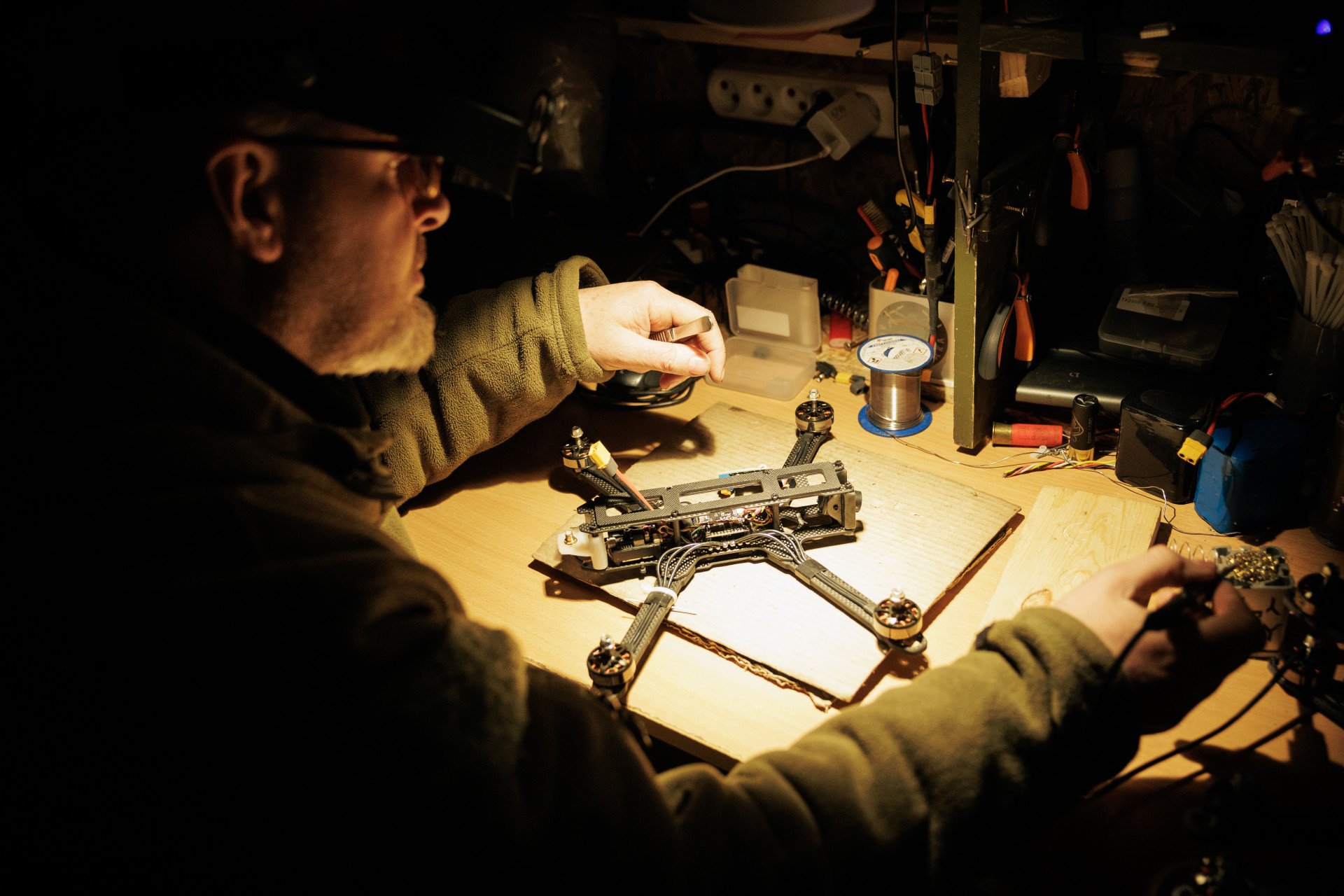 A Ukrainian serviceman of the UAV unit “Bulava” repairs a drone in a workshop on February 16, 2025 in Unspecified, Ukraine. (Photo by Serhii Mykhalchuk via Getty Images) A Ukrainian serviceman of the UAV unit “Bulava” repairs a drone in a workshop on February 16, 2025 in Unspecified, Ukraine. (Photo by Serhii Mykhalchuk via Getty Images)