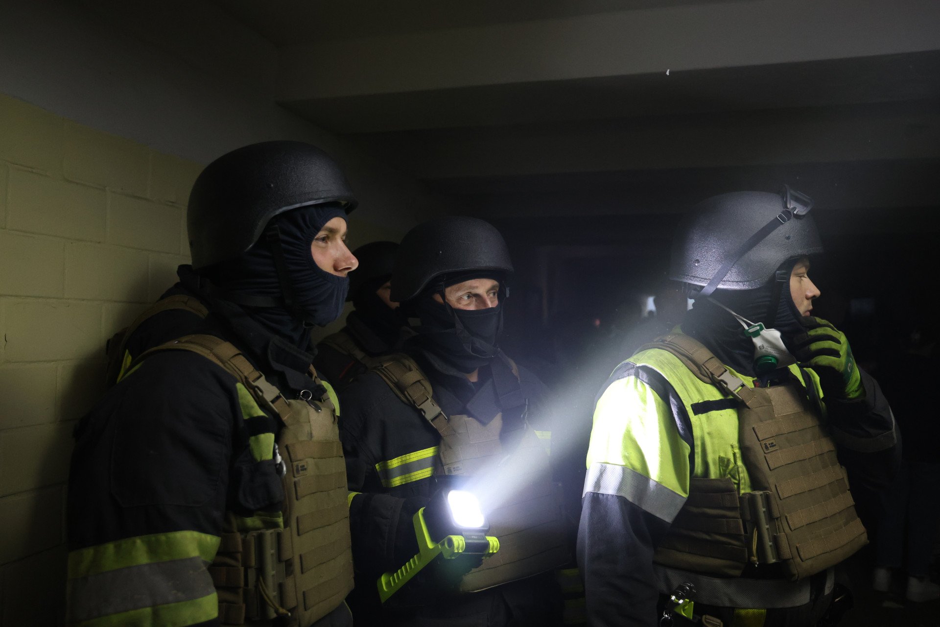 Firefighters take shelter in underpass at residential district during repeated attack of Russian drones and missiles on June 17, 2025 in Kyiv, Ukraine. (Photo by Ivan Antypenko via Getty Images)