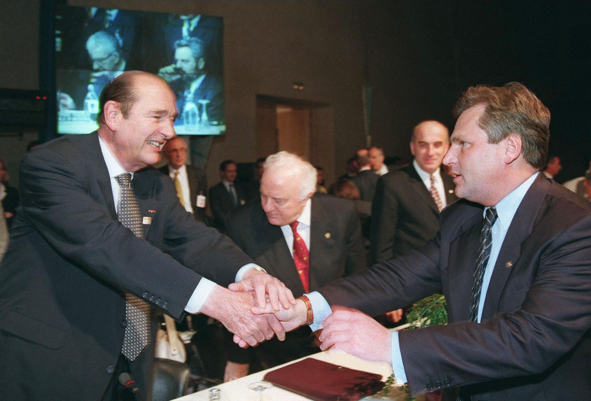 French President Jacques Chirac shakes hands with Polish President Aleksander Kwasniewski in Madrid on July 9, 1997, ahead of a NATO meeting where the alliance agreed to begin membership talks with Poland, Hungary, and the Czech Republic. (Source: Getty Images) French President Jacques Chirac shakes hands with Polish President Aleksander Kwasniewski in Madrid on July 9, 1997, ahead of a NATO meeting where the alliance agreed to begin membership talks with Poland, Hungary, and the Czech Republic. (Source: Getty Images)