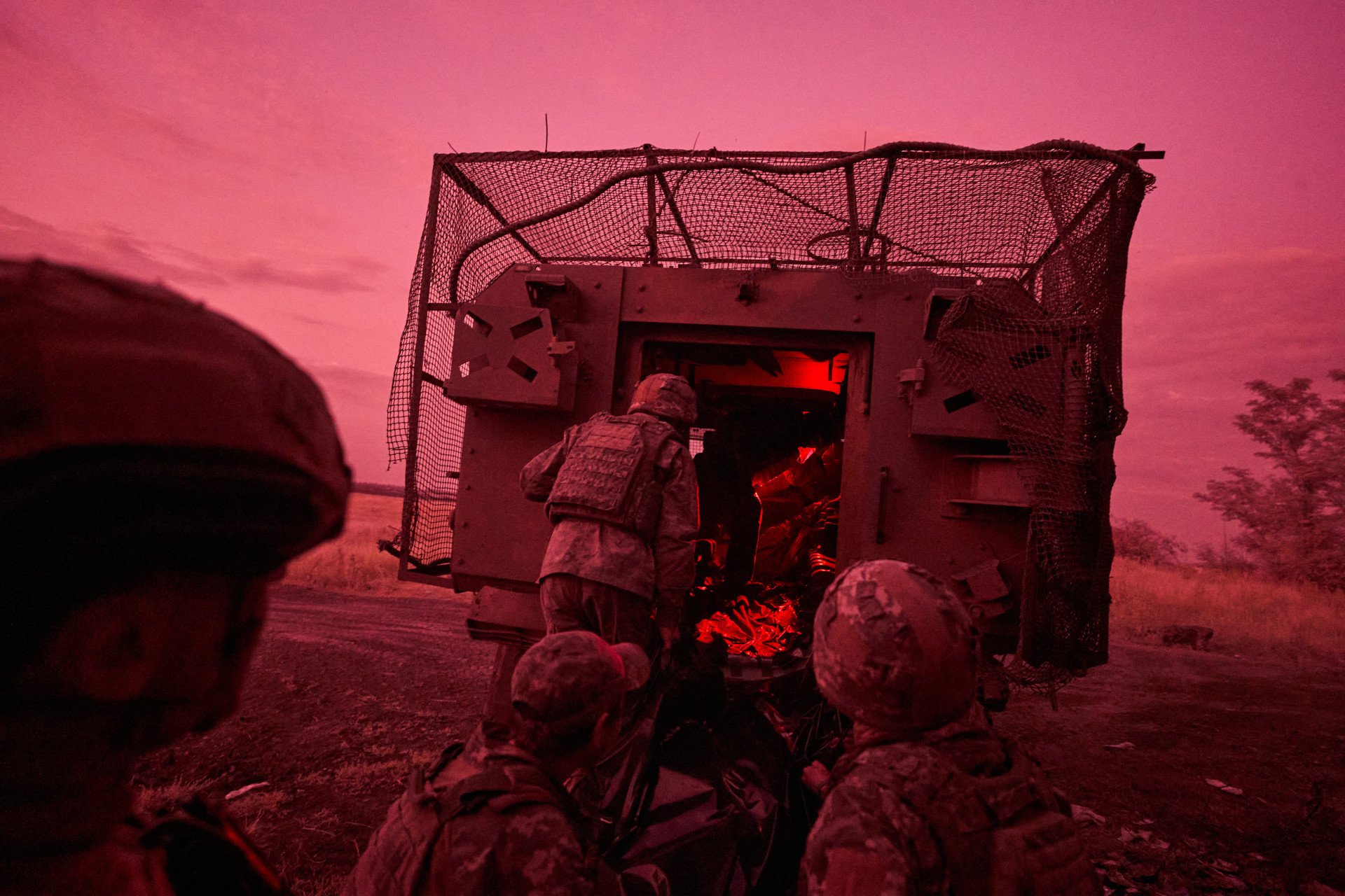 On July 21, 2025, in Donetsk Region, Ukraine, near the Donetsk–Dnipropetrovsk border, a soldier is rescued from an infantry position by an armored infantry fighting vehicle during a medical evacuation conducted by the 505th Separate Marine Battalion. (Source: Getty Images)