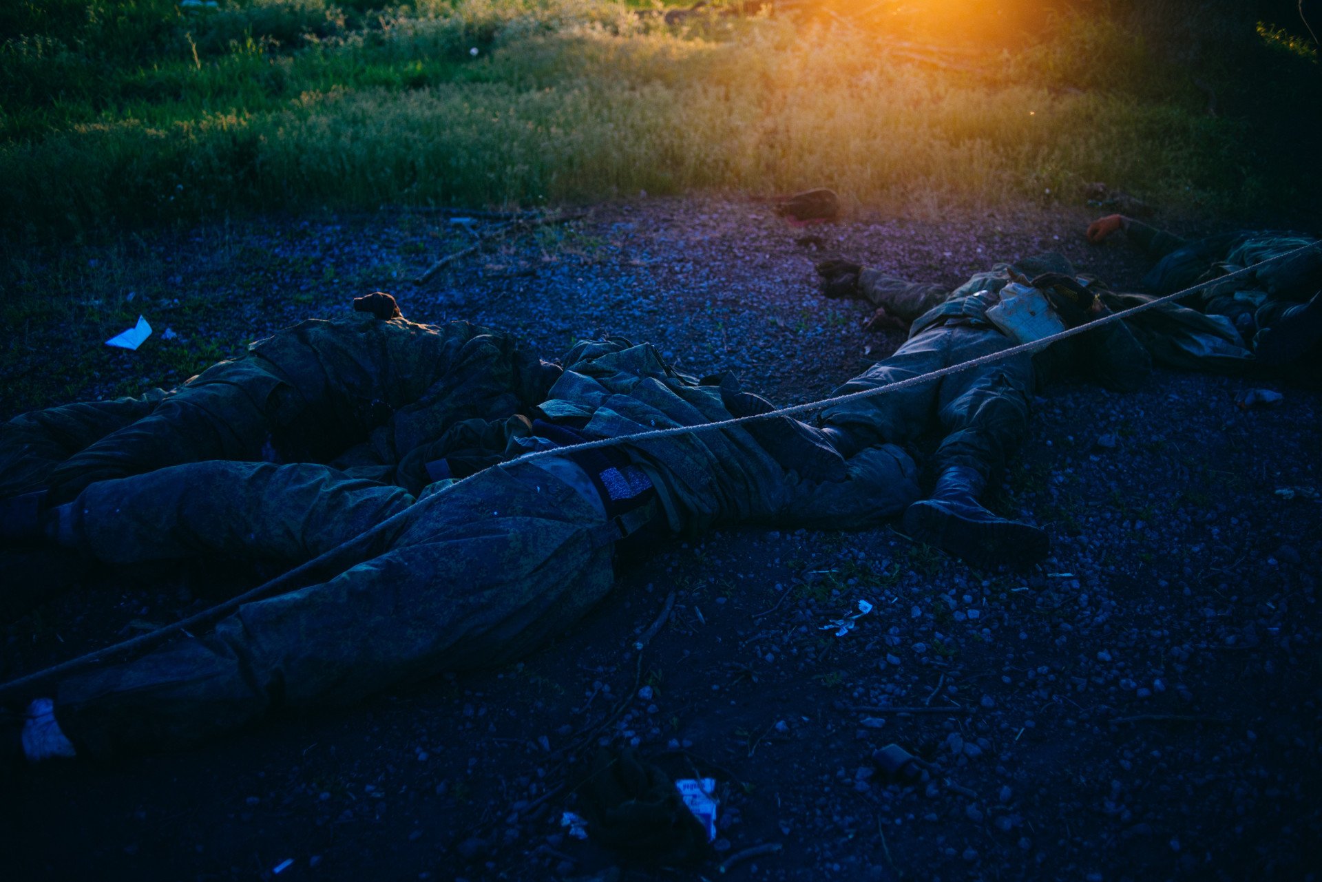 The bodies of three Russian soldiers found in the village of Vilkhivka in Ukraine after it was liberated by the Ukrainian Armed Forces. (Photo: Julia Kochetova part of her multimedia project “War is Personal.”)