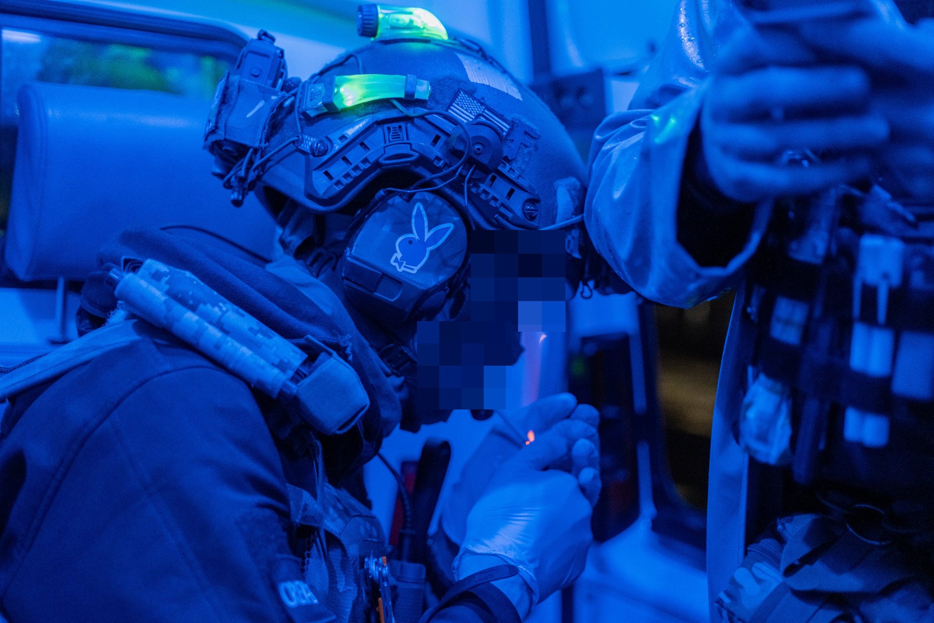 Lastivka, the young commander of Kyiv’s Medical Crew 13, sits inside the team’s emergency rescue vehicle during a nighttime deployment. As Russian combined missile and drone attacks strike the capital, young first responders like Lastivka rush into the rubble under the constant threat of targeted double-tap strikes. (Photo: Nikita Lisovyi / UNITED24 Media) Young paramedic commander Lastivka sitting inside Kyiv’s Medical Crew 13 emergency vehicle preparing for a nighttime civilian rescue mission under missile fire.