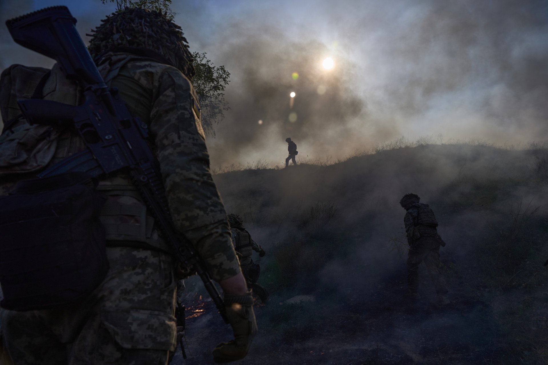 A smoke screen conceals assault teams from enemy view, providing cover and disorienting opposing forces. A smoke screen conceals assault teams from enemy view, providing cover and disorienting opposing forces.