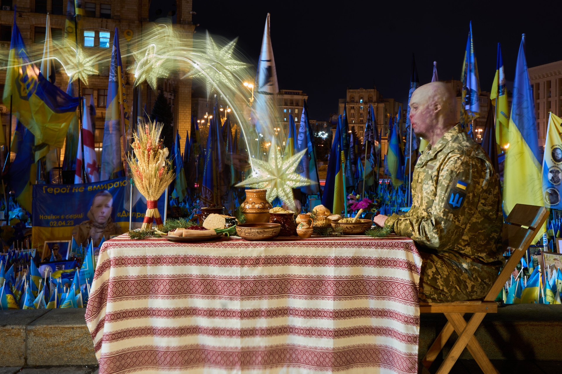 Ukrainian serviceman Yehor Babenko at a Christmas table