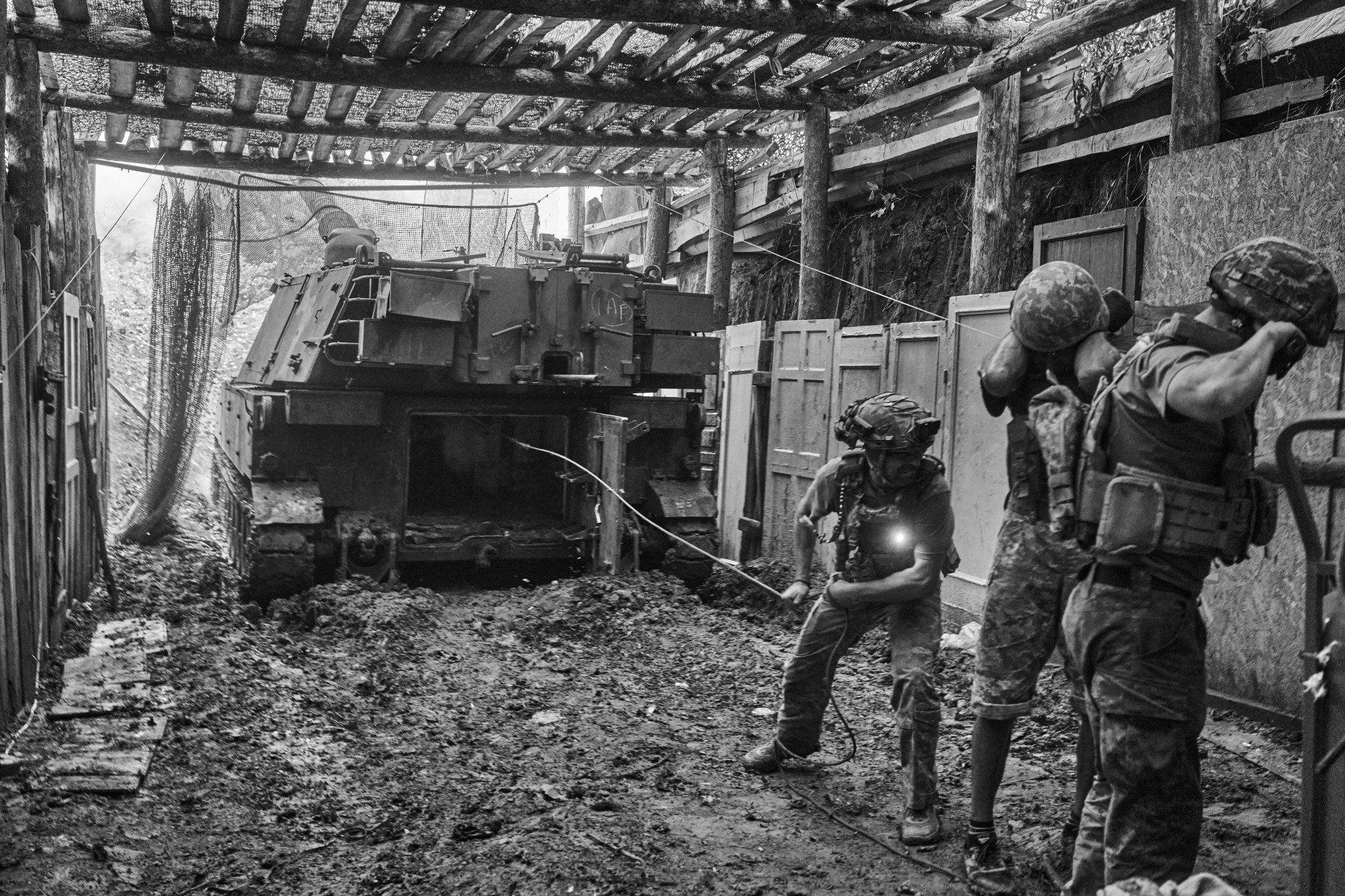 Members of the 28th Brigade brace as the massive artillery gun fires. Kostiantynivka, August 2025. Photo: Josh Olley/UNITED24 Media
