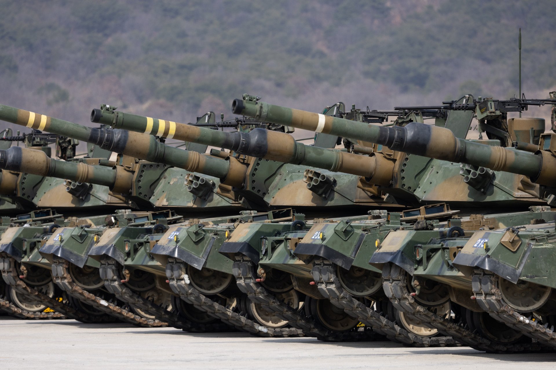South Korean army K1A1 tanks, manufactured by Hyundai Rotem Co., during a joint live-fire exercise with the US Army at Rodriguez Range in Pocheon, South Korea, on Wednesday, March 22, 2023. South Korean army K1A1 tanks, manufactured by Hyundai Rotem Co., during a joint live-fire exercise with the US Army at Rodriguez Range in Pocheon, South Korea, on Wednesday, March 22, 2023.