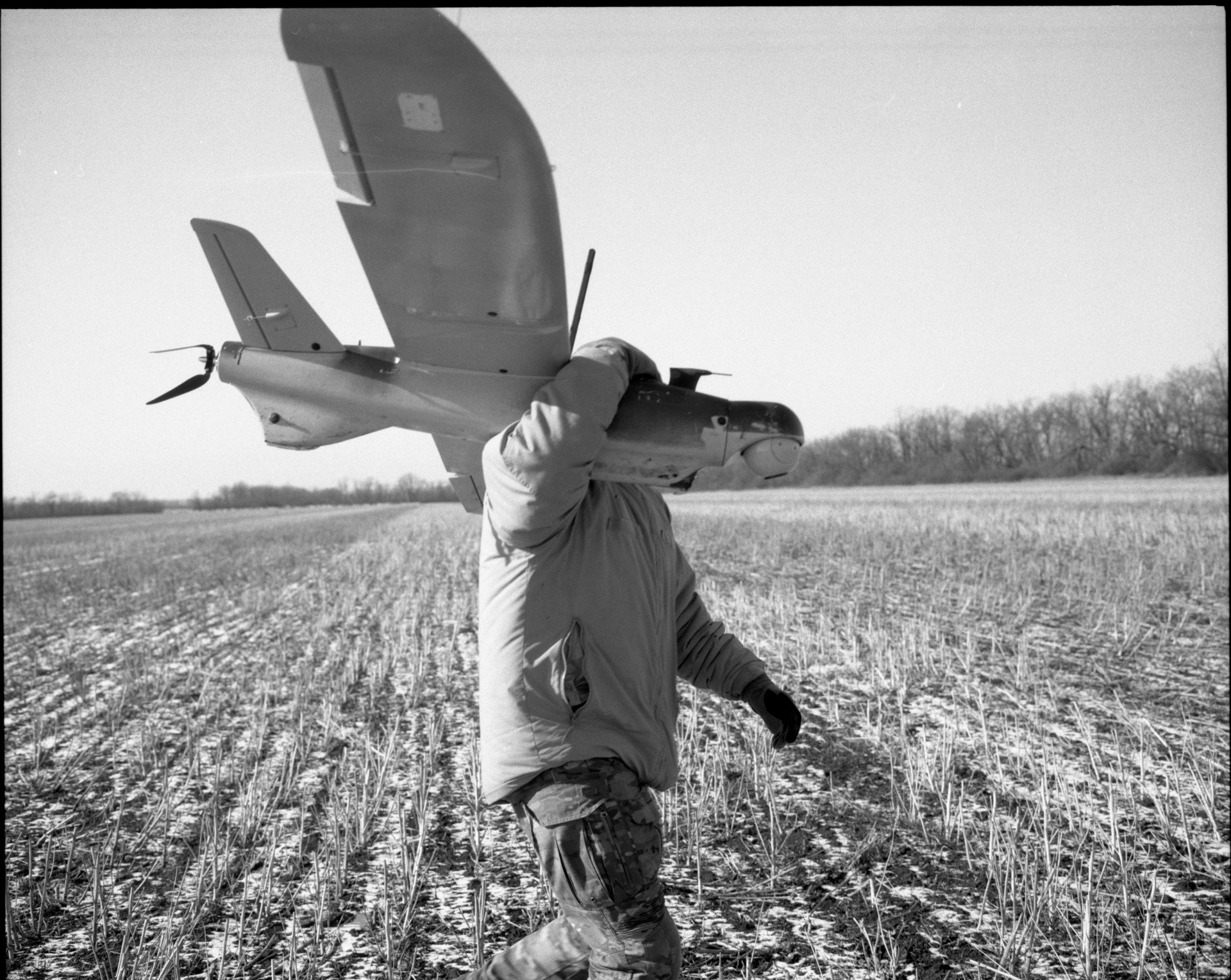 On February 11, a volunteer unit fighter launches a «Leleka» drone in the Donetsk region. Photo by Vladyslav Krasnoshchok.