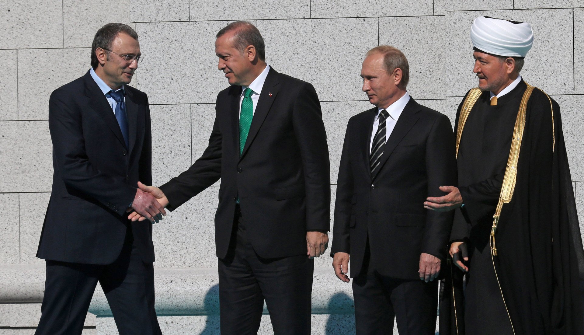 Russian leader Vladimir Putin, Turkish President Tayyip Erdogan, Russian oligarch Suleiman Kerimov, and Grand Mufti Ravil Gainutdin attend the opening ceremony of the restored Moscow Cathedral Mosque on 23 September 2015 in Moscow. (Source: Getty Images). Russian leader Vladimir Putin, Turkish President Tayyip Erdogan, Russian oligarch Suleiman Kerimov, and Grand Mufti Ravil Gainutdin attend the opening ceremony of the restored Moscow Cathedral Mosque on 23 September 2015 in Moscow. (Source: Getty Images).