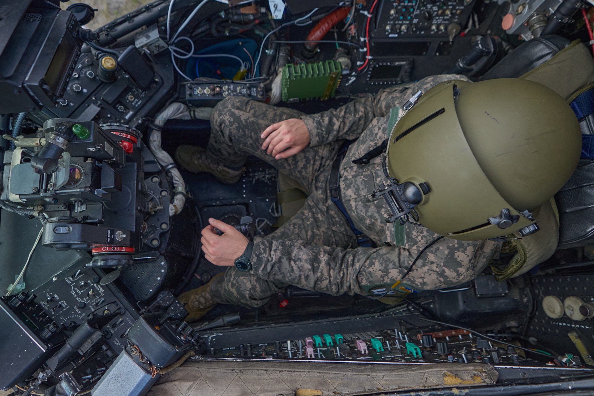 Inside the cockpit of a Mi-24: the pilot prepares for flight, ready for takeoff. Inside the cockpit of a Mi-24: the pilot prepares for flight, ready for takeoff.