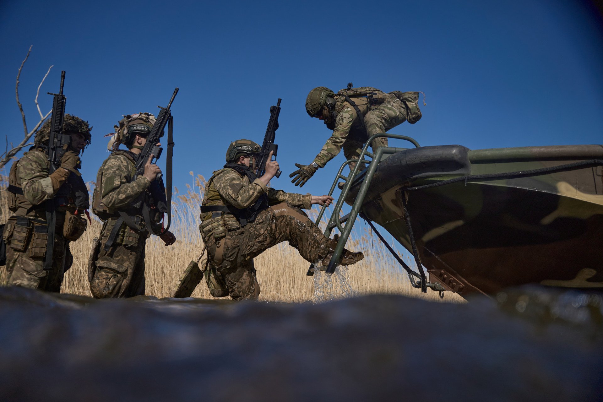 “We know its scent. We remember how it carried our boats toward the places still held by the enemy. We, the fighters of the 144th Special Operations Forces Center, are back on the water.” Photo: Mykyta Shandyba/UNITED24 Media. “We know its scent. We remember how it carried our boats toward the places still held by the enemy. We, the fighters of the 144th Special Operations Forces Center, are back on the water.” Photo: Mykyta Shandyba/UNITED24 Media.