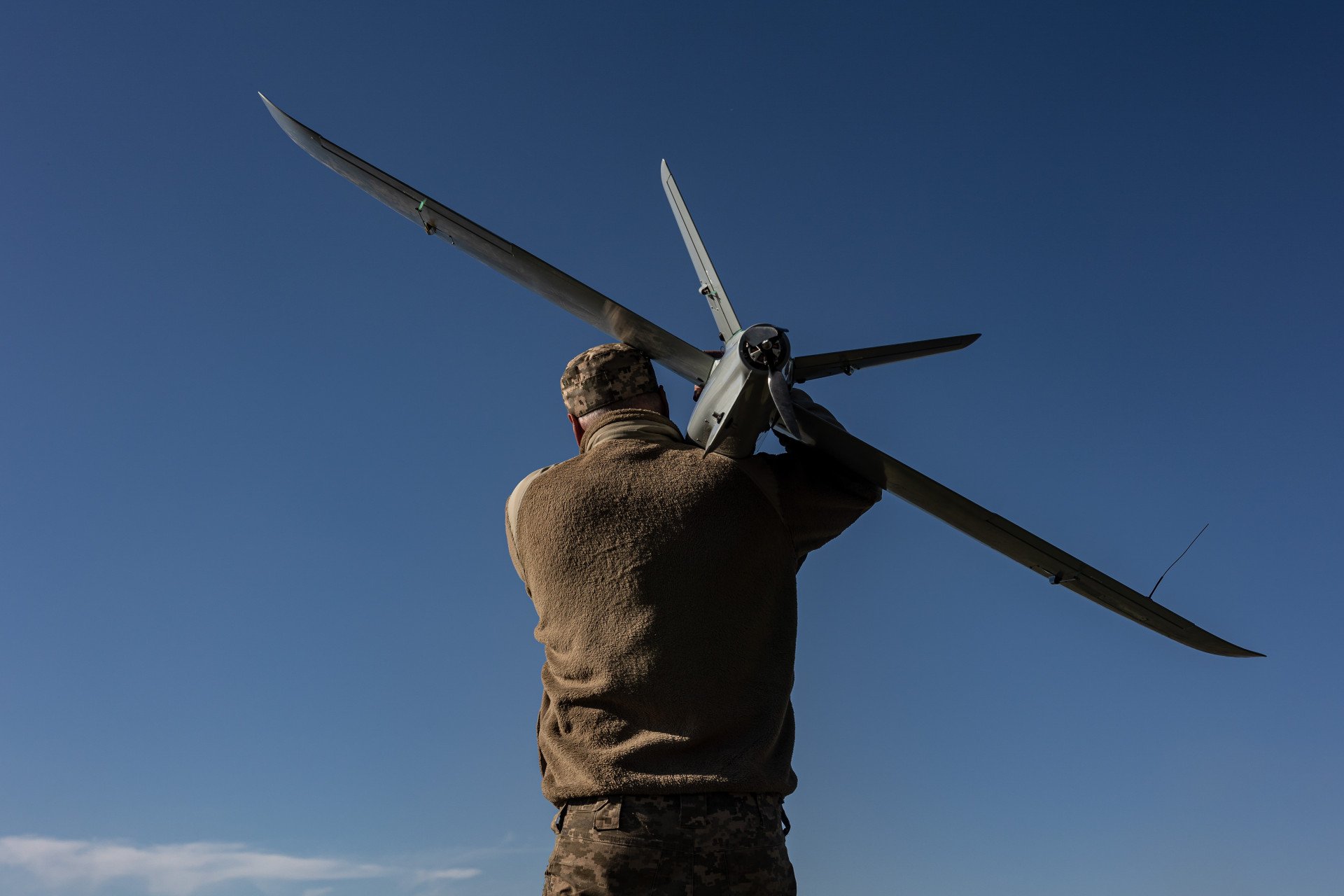 A Ukrainian air intelligence soldier carries a drone in the direction of Bakhmut, Ukraine, on May 10, 2024. (Photo: Diego Herrera Carcedo via Getty Images) 