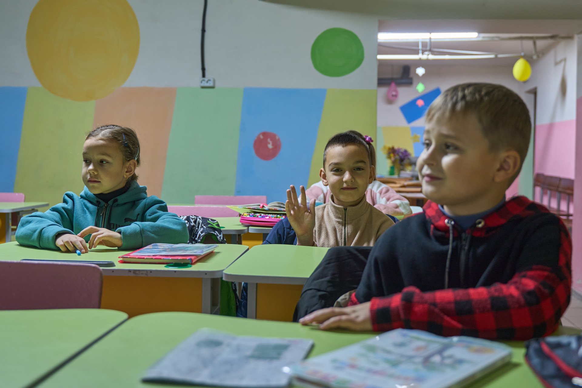 Children in Sumy region school bomb shelter