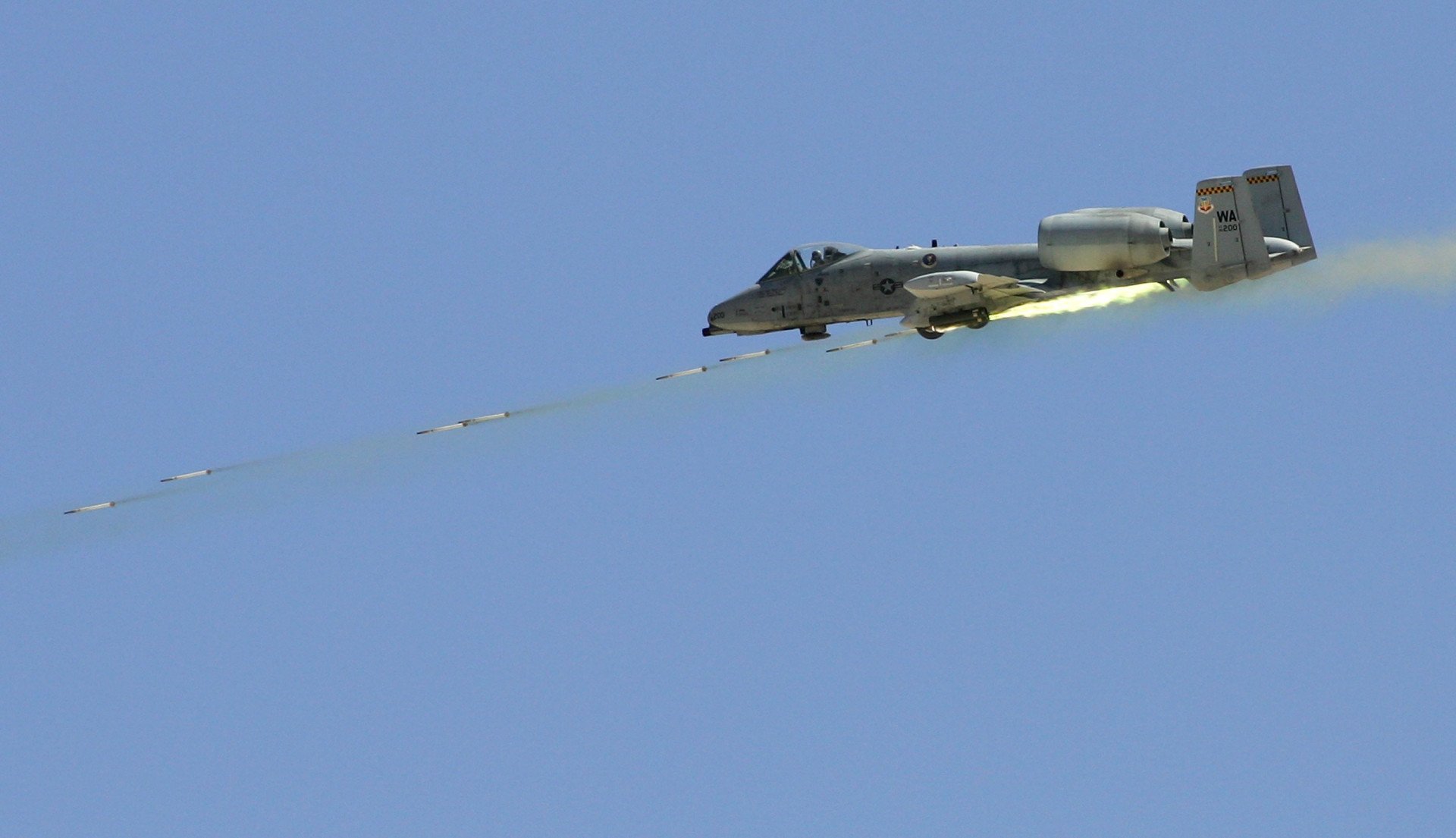 An A-10 Thunderbolt fires rockets during a US Air Force firepower demonstration at the Nevada Test and Training Range, September 14, 2007, near Indian Springs, Nevada. (Source: Getty Images)