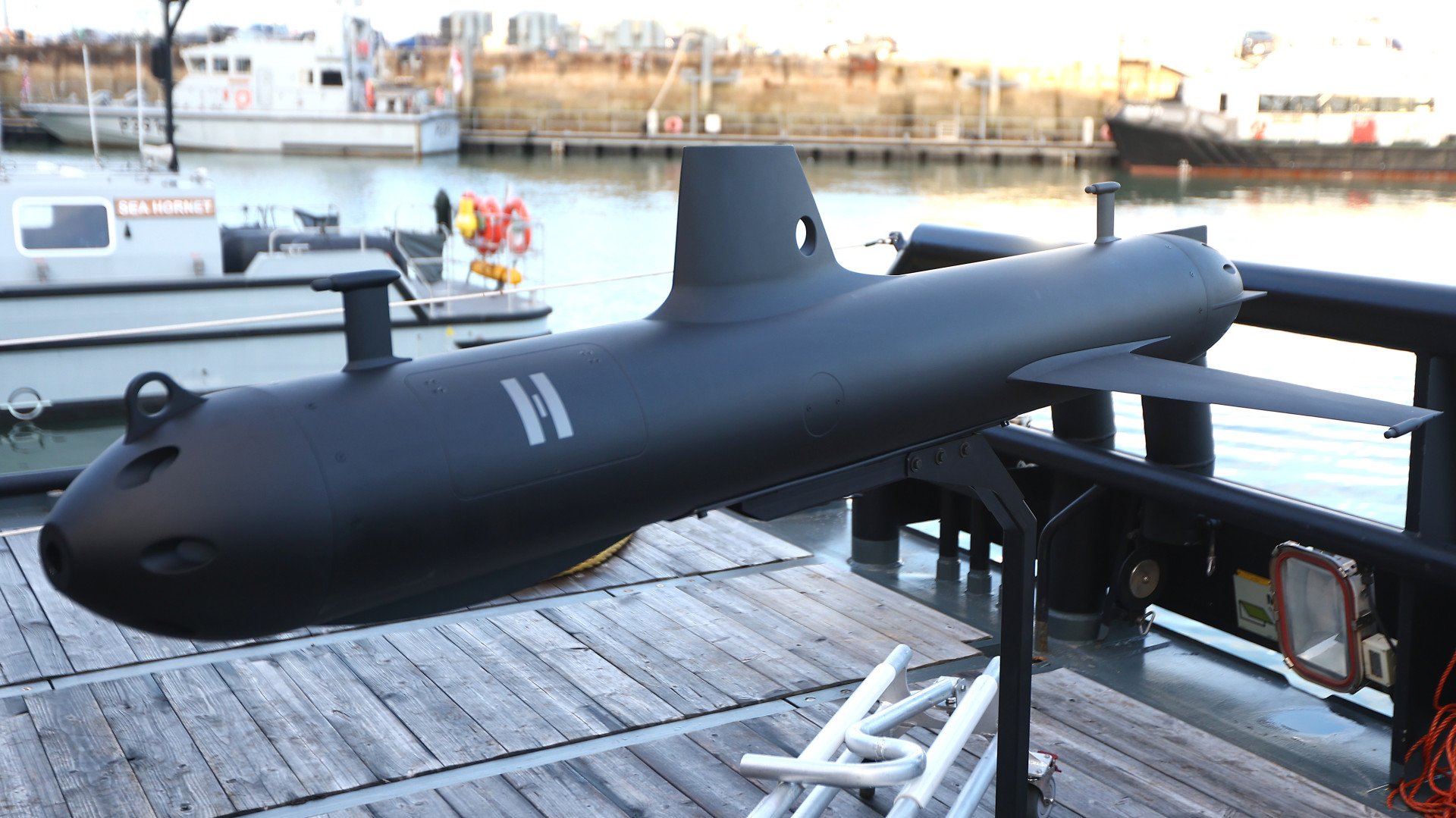 A life-size autonomous underwater glider called SG-1 Fathom is seen at the unveiling of the Atlantic Bastion programme on December 4, 2025, in Portsmouth, England. (Source: Getty Images)