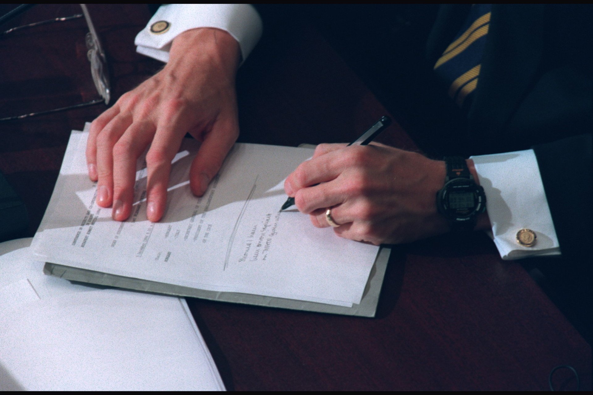 Budapest, Hungary, December 5, 1994: The Budapest Memorandum on Security Assurances, comprising three nearly identical political agreements, signed at the conference. US President Bill Clinton signing the final agreement.  (Photo by THIERRY ORBAN/Sygma via Getty Images)