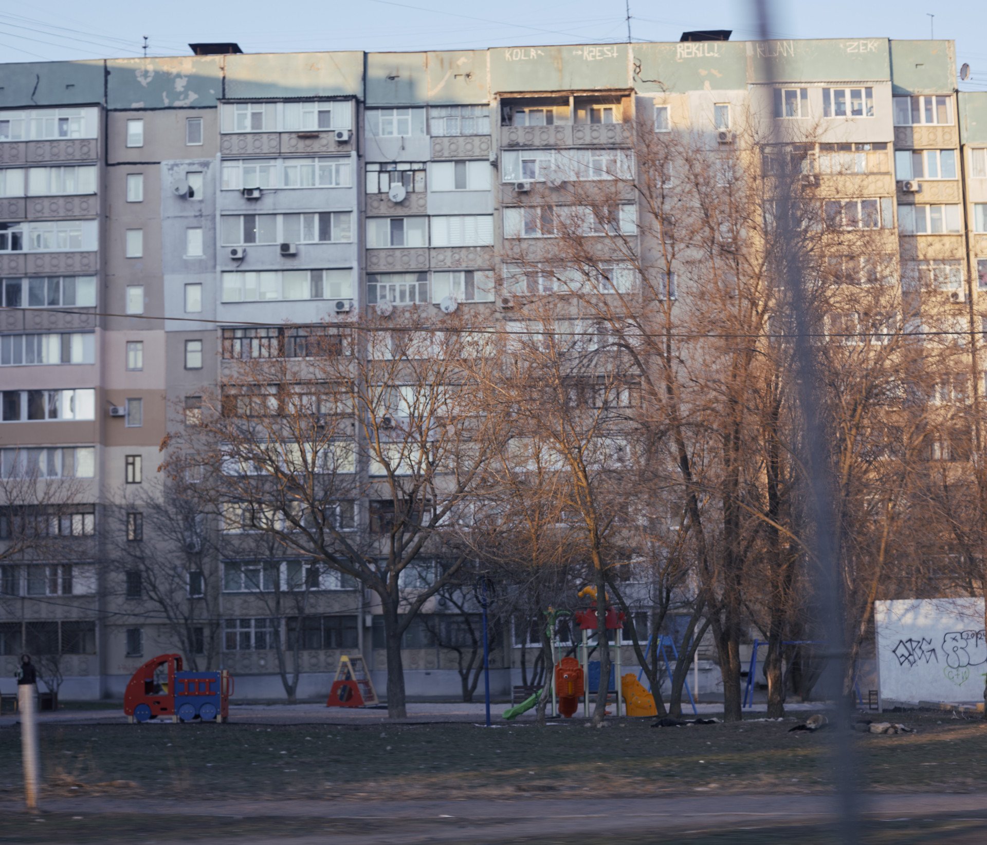 An empty playground in front of an apartment block in central Kherson. (Source: UNITED24 Media/Joshua Olley) An empty playground in front of an apartment block in central Kherson. (Source: UNITED24 Media/Joshua Olley)