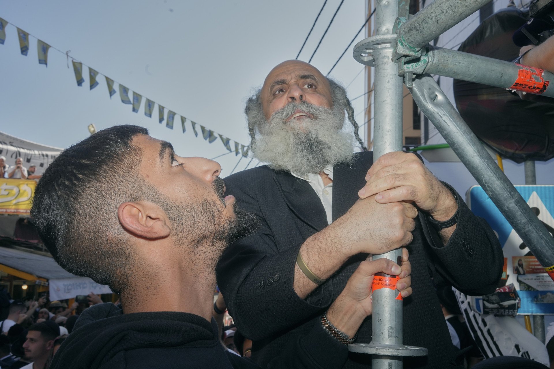 Trying to get above the crowd. Uman, Ukraine. September, 2025. Photo: Josh Olley/UNITED24 Media