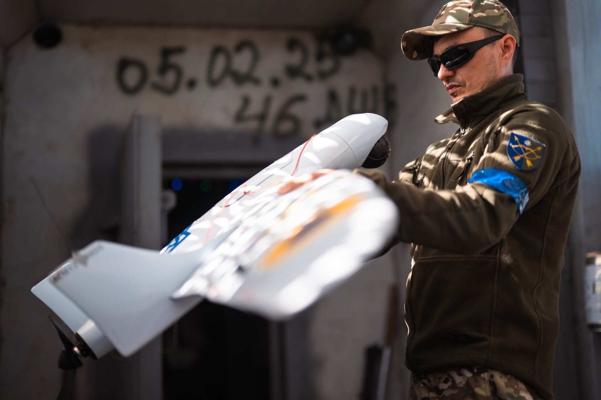 Ukrainian soldier with drone How Ukraine’s Drone Warfare Is Forcing Europe to Rethink Defense Economics