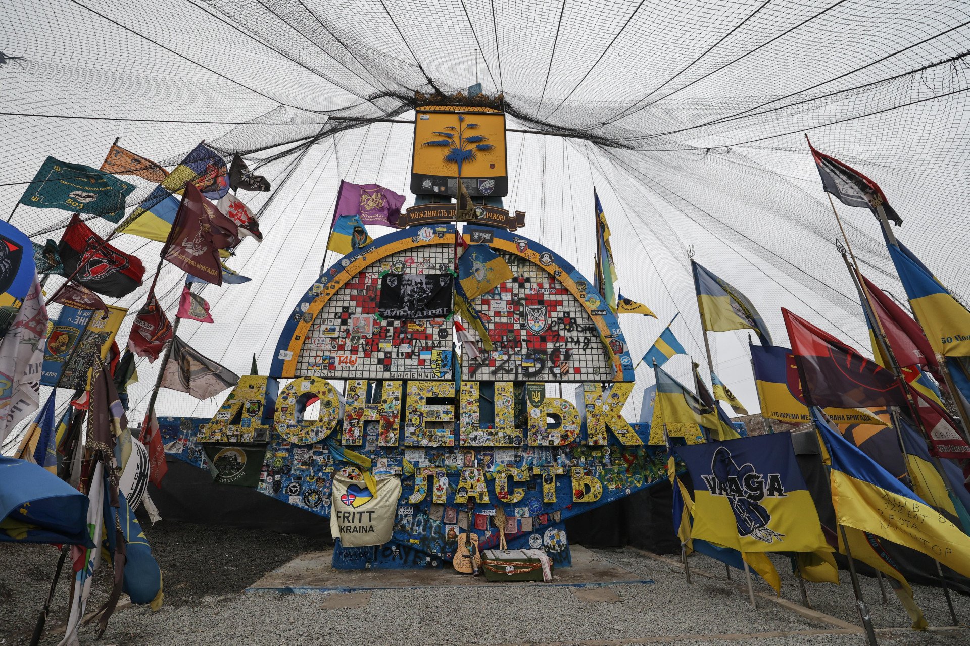 On February 7, the legendary sign at the entrance to the Donetsk region from the Dnipropetrovsk side is seen covered with an anti-drone net. The front line is about 20 km from here. Photo by Serhii Nuzhnenko for Radio Free Europe/Radio Liberty