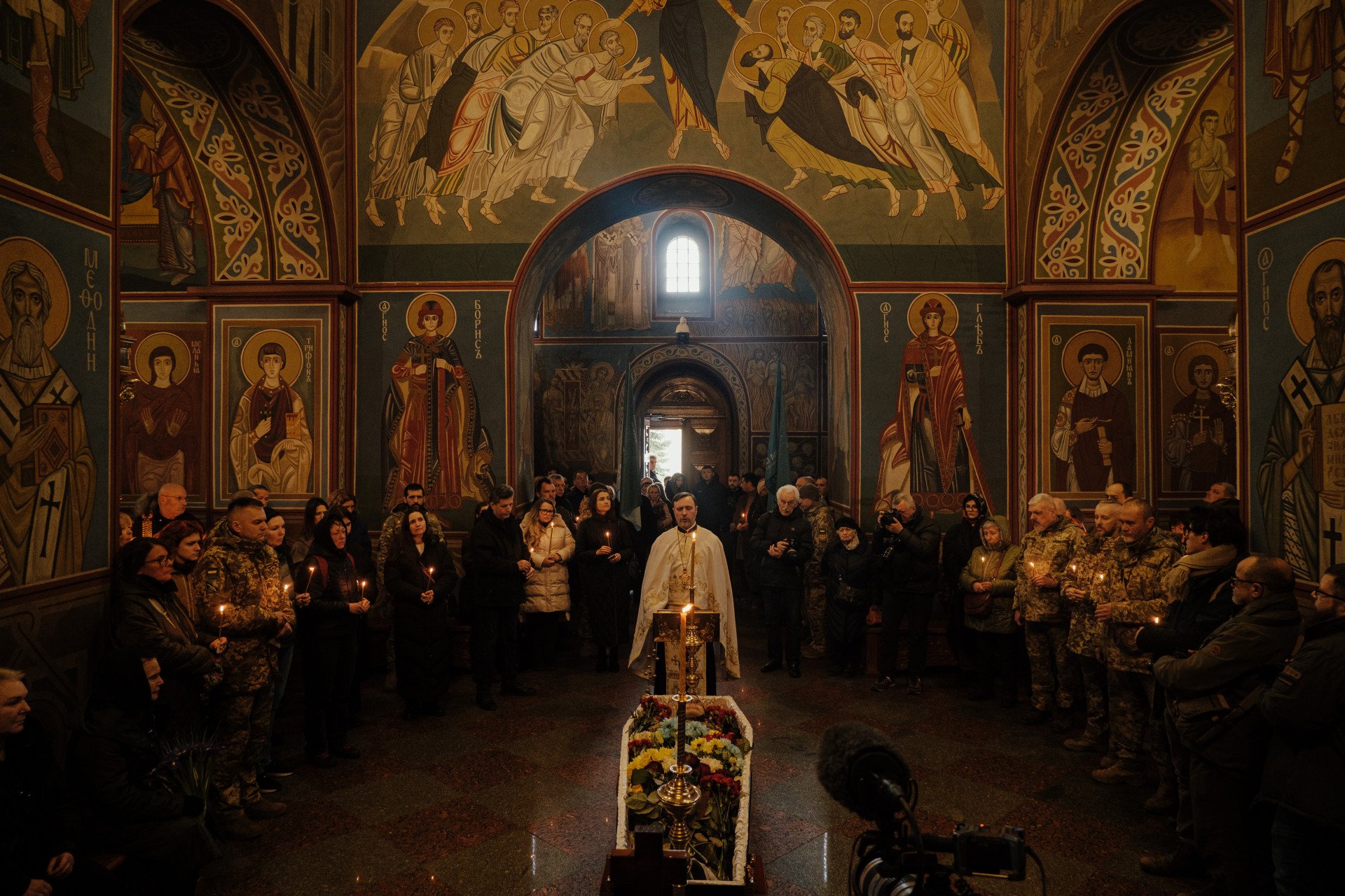 MAR 05 — Two brothers, one fight. The funeral of Vasyl Ratushnyi—a drone pilot, a soldier—who now joins his younger brother, Roman Ratushnyi, killed in 2022. Their father, a serviceman, has lost both his sons to the war.(Photo by Taras Fedorenko/Slidstvo.info)