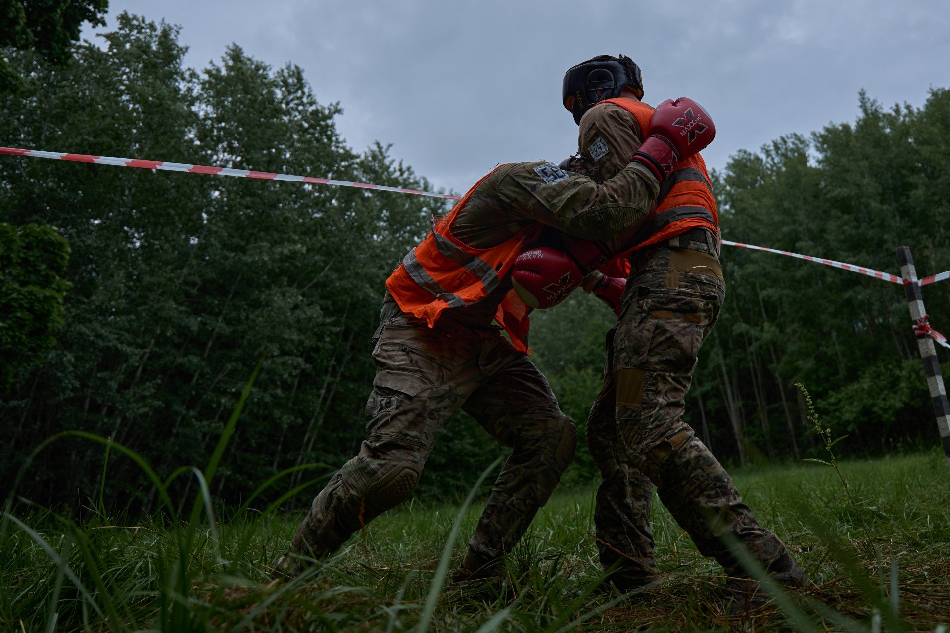 After several days of physical and psychological stress—also aimed at building team cohesion—the candidates are put into sparring matches with each other. It’s challenging both physically and mentally. After several days of physical and psychological stress—also aimed at building team cohesion—the candidates are put into sparring matches with each other. It’s challenging both physically and mentally.
