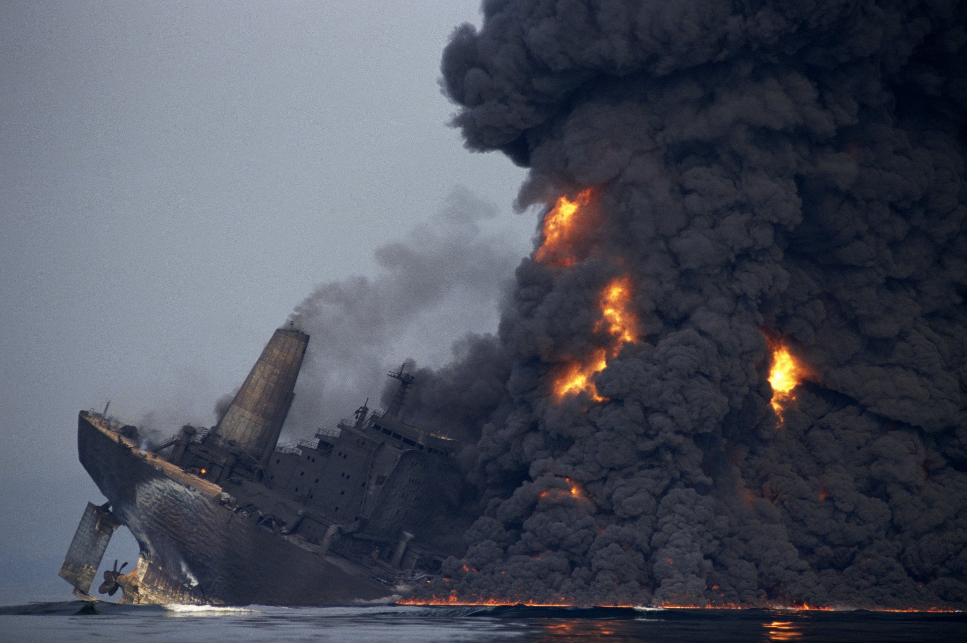 An ecological catastrophe along the Italian coast, the explosion of the Haven oil tanker creates billowing clouds of atmospheric pollution. (Photo by Alberto Pizzoli via Getty Images)