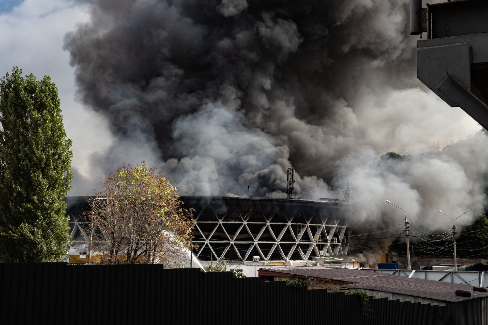 Smoke rises above a market building damaged by a Russian drone on September 23, 2026 in Kyiv, Ukraine. Russian armed forces massively shelled Kyiv with missiles and jet drones, resulting in casualties and destruction in various residential districts across the city. (Photo by Roman Chop via Getty Images) Smoke rises above a market building damaged by a Russian drone on September 23, 2026 in Kyiv, Ukraine. Russian armed forces massively shelled Kyiv with missiles and jet drones, resulting in casualties and destruction in various residential districts across the city. (Photo by Roman Chop via Getty Images)